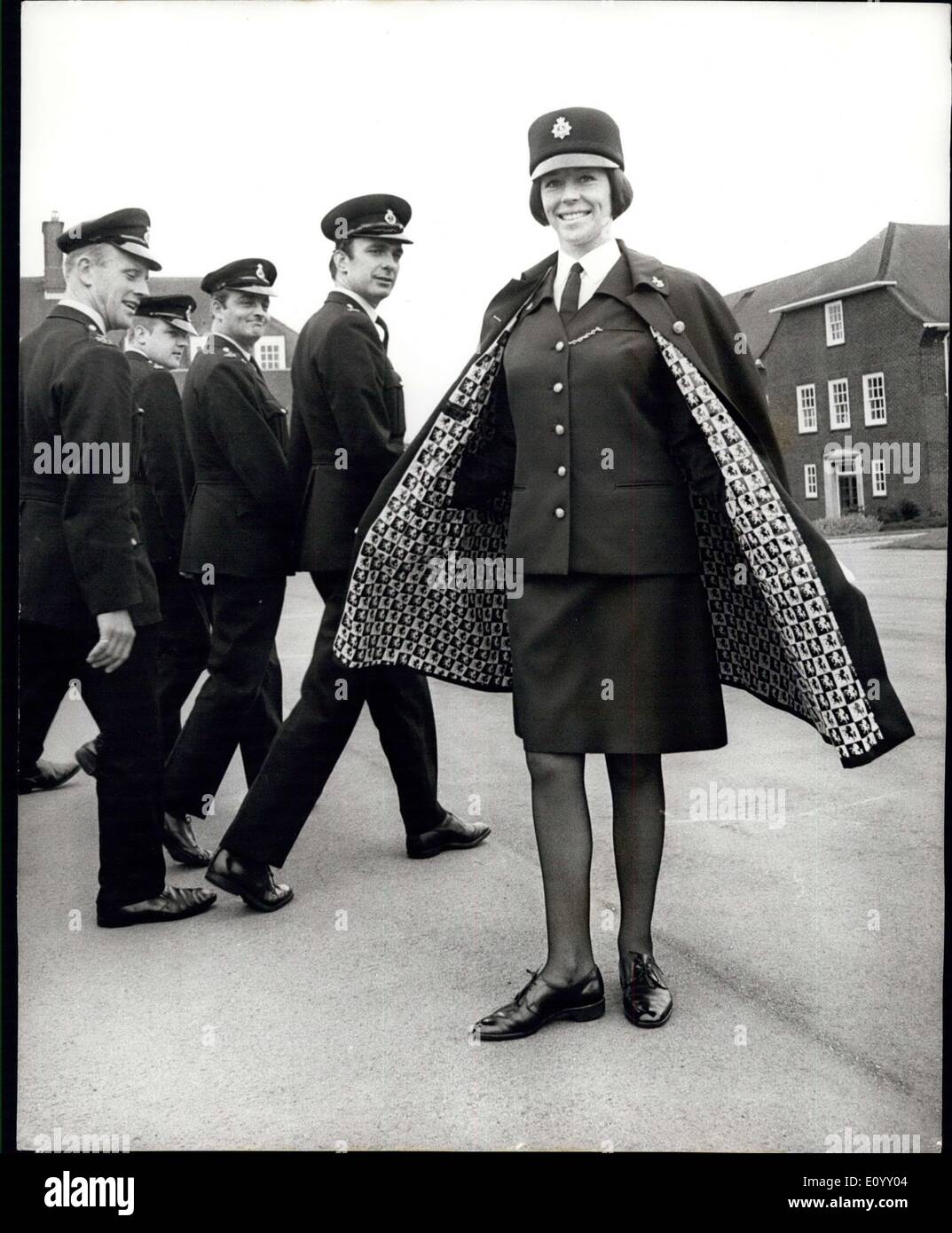Oct. 11, 1971 - New Style Uniform For Kent Women Police: Women Officers and girl cadets in the Kent police Force will have a new style uniform from next April when the present uniform, adopted in 1961, will be phased out. The new new uniform will be issued to recruits and girl cadets on enrollment but serving policeman will receive the new uniforms as their existing garments become unserviceable. The new uniform is 55% terylene and 45% wool worsted, The uniform, which includes a full length cape, has been designed by Miss J. Moore, Head of the Art department of Thannet Technical College Stock Photo