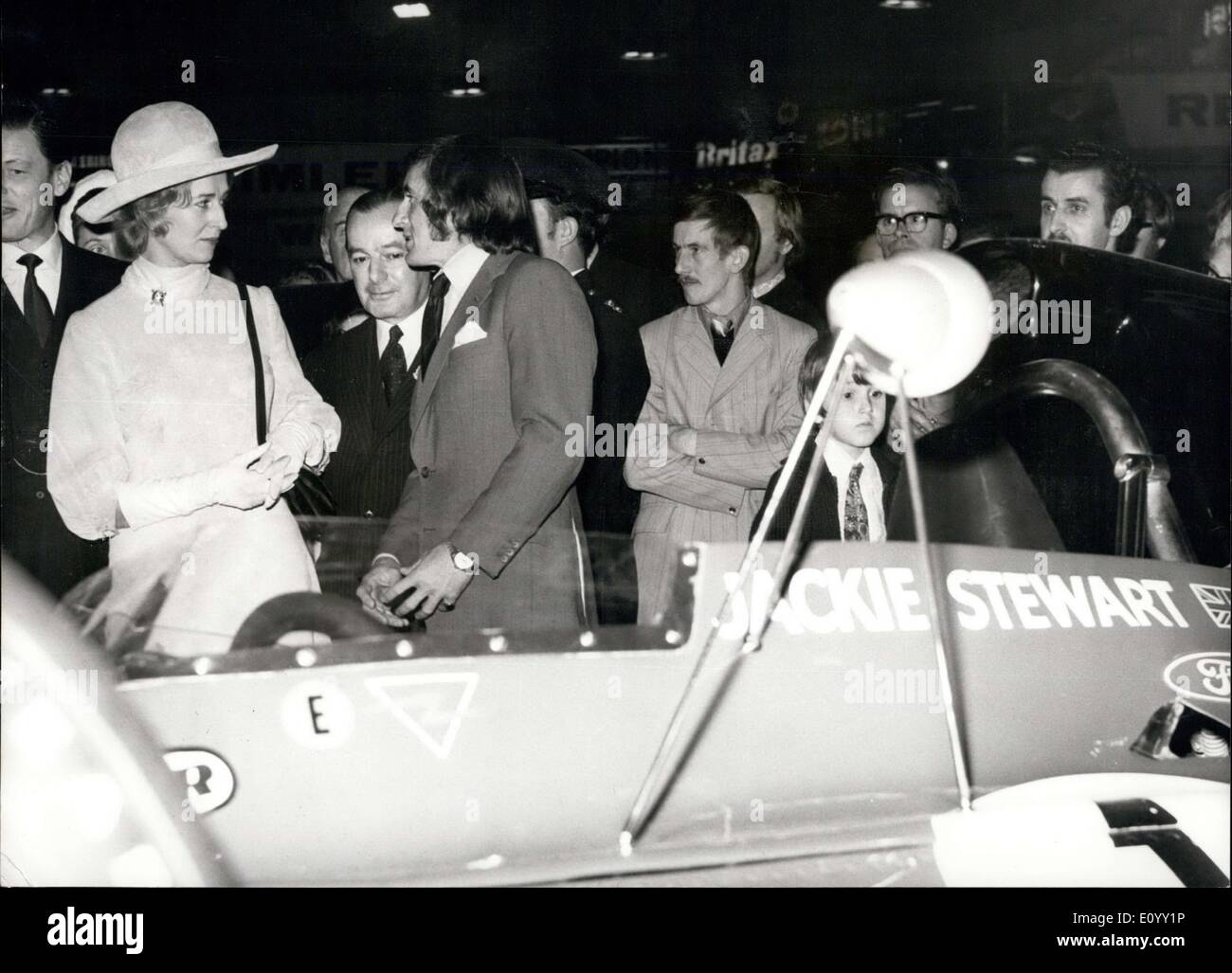 Oct. 20, 1971 - Princess Alexandra opens Motor show.: princess Alecandra this morning opened the 1971 Motor Show at Earls Court, London after making a tour of the show with her husband, Mr. Angus Ogilvy. Photo shows Princess Alexandra is talking to World Racing Champion Jackie Stewart during her tour of the show in the foreground is the World Champion's car the Tyrell Ford. Stock Photo