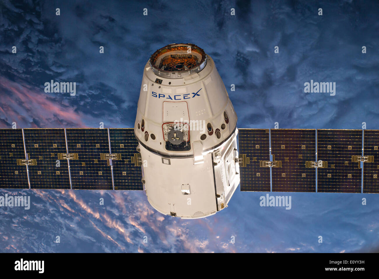 The SpaceX Dragon unmanned space capsule approaches the International Space Station April 20, 2014 . Stock Photo