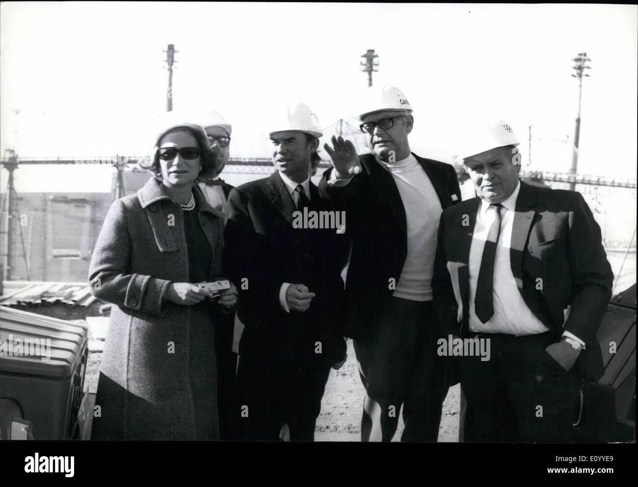 Nov. 11, 1971 - The Grand Duke and Grand Duchess of Luxembourg on an official visit to the Olympic building site in Munich.: Following a personal invitation by Herr Willi Baume, President of the Olympic Committee, Grand Duke Jean and Grand Duchess Charlotte of Luxembourg arrived in the Bavarian capital to take a look at the progress on the construction site. The Grand Duke has himself been a member of the International Olympic Committee since 1946. Even the aristocratic status of the visitors did not excempt then from wearing the compulsory safety helmet Stock Photo