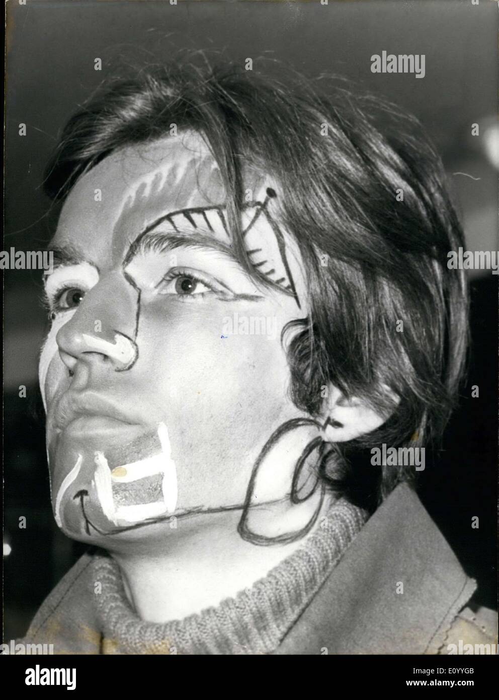 Nov. 13, 1971 - Vincent Roux is painting the faces of Paco Rabanne's clients and friends. Here is a picture of a young man with Stock Photo