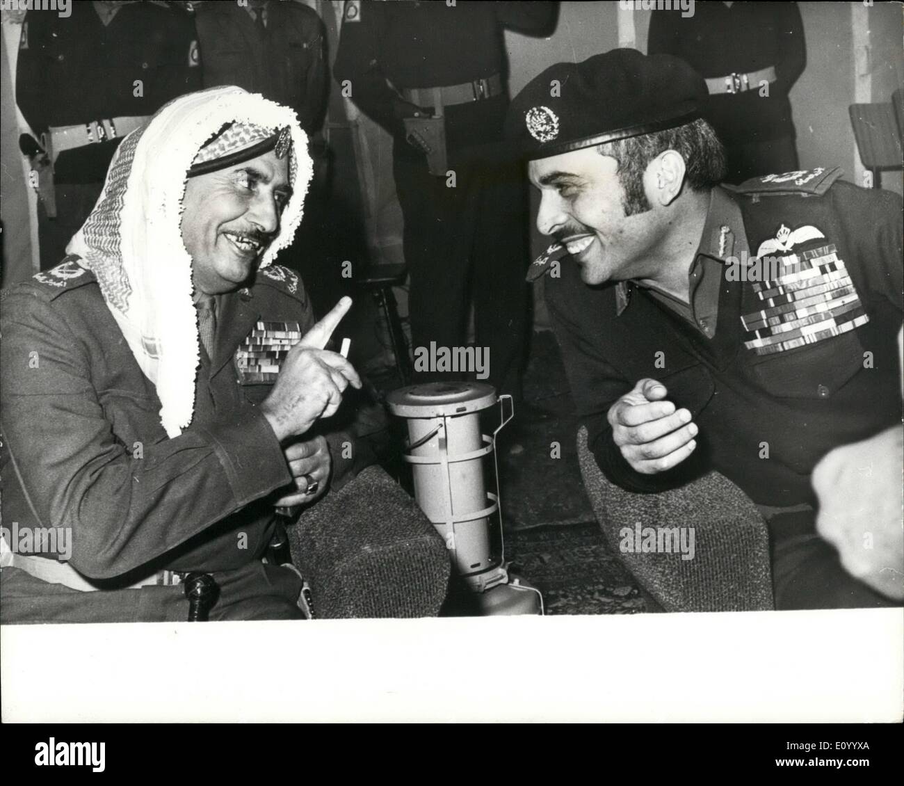 Dec. 12, 1971 - King Hussein visits first Royal armoured battalion.'' King Hussein of Jordan recently visited the Royal Armoured Battalion, on the occasion of the battalion's 21st. anniversary of its founding. Photo shows King Hussein (right) talking with Marshall Habes al-Majali, Commander-in-Chief of the Jordanian Armed Force, during the anniversary celebrations. Stock Photo