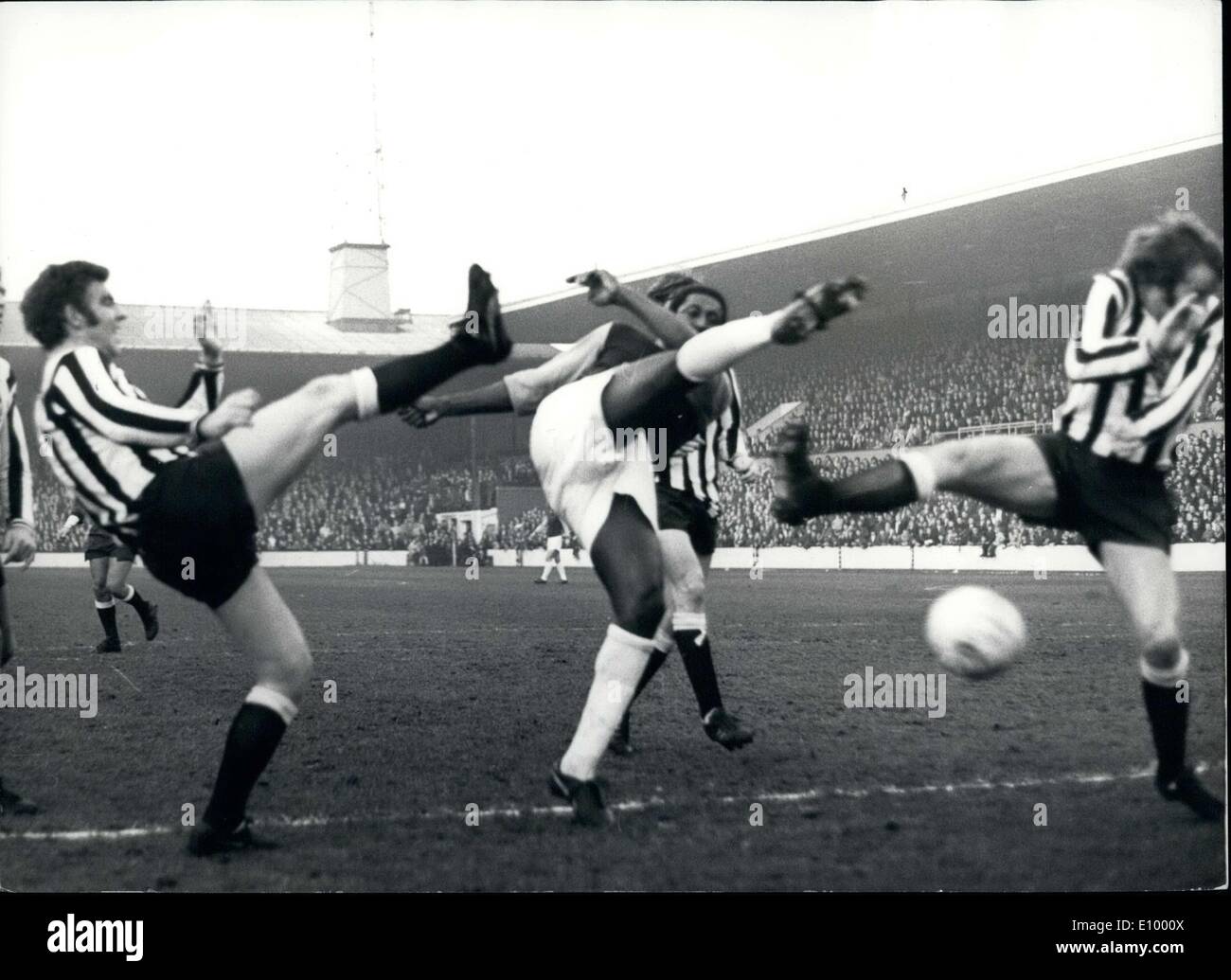 Dec. 18, 1971 - West Ham V Newcastle. Photo shows It was a game with plenty of kick in it - as (L to R) : Ollie Burton (Newcastle) : Clyde Best (West Ham) and Frank Clark (Newcastle), all go for the ball, during today's game at Upton Park. Newcastle won 0-1. Stock Photo