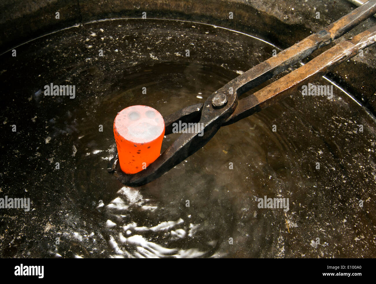 Hot iron piece quenched in water. Artisans Nicole & Harry Hansen, Sterling & Steel, create