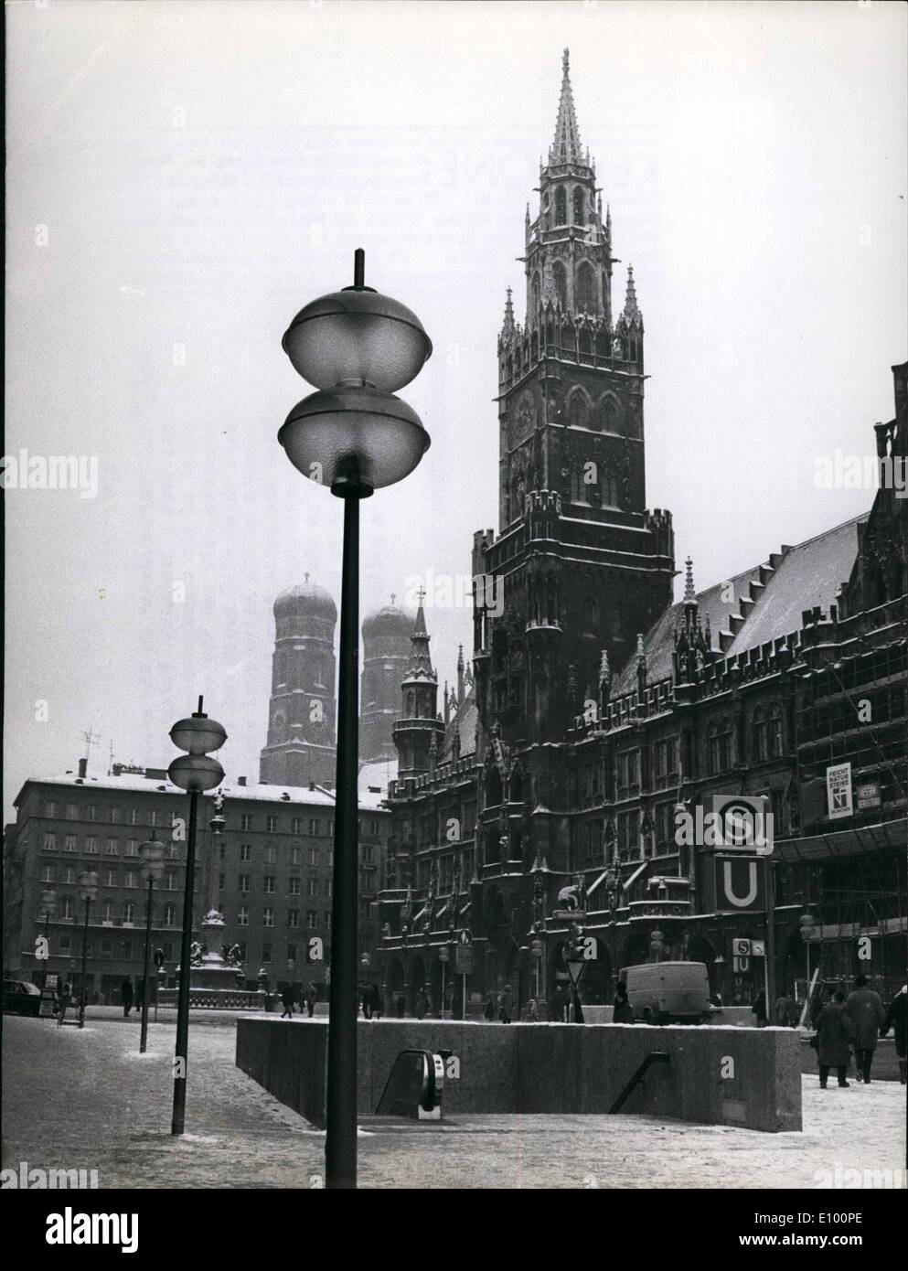 Feb. 02, 1972 - Olympic City Munich. Photo shows the Marienplatz in the centre of Munich always has been a landmark. Today the place is a cross point of the underground lines which were built for the Olympics 1972 and the centre of a systems of pedestrian ways which will reach out to parts of the shopping streets of the historical city centre. The Marienplatz with the gotic town hall, behind which the towers of the Frauenkirche can be seen is one of the most visited places in the Olympic City Stock Photo