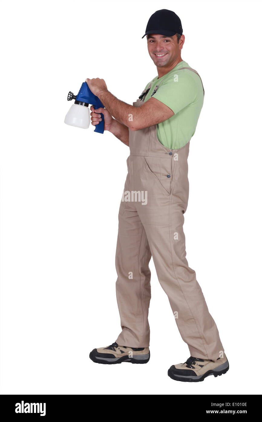 Man holding a spray gun Stock Photo