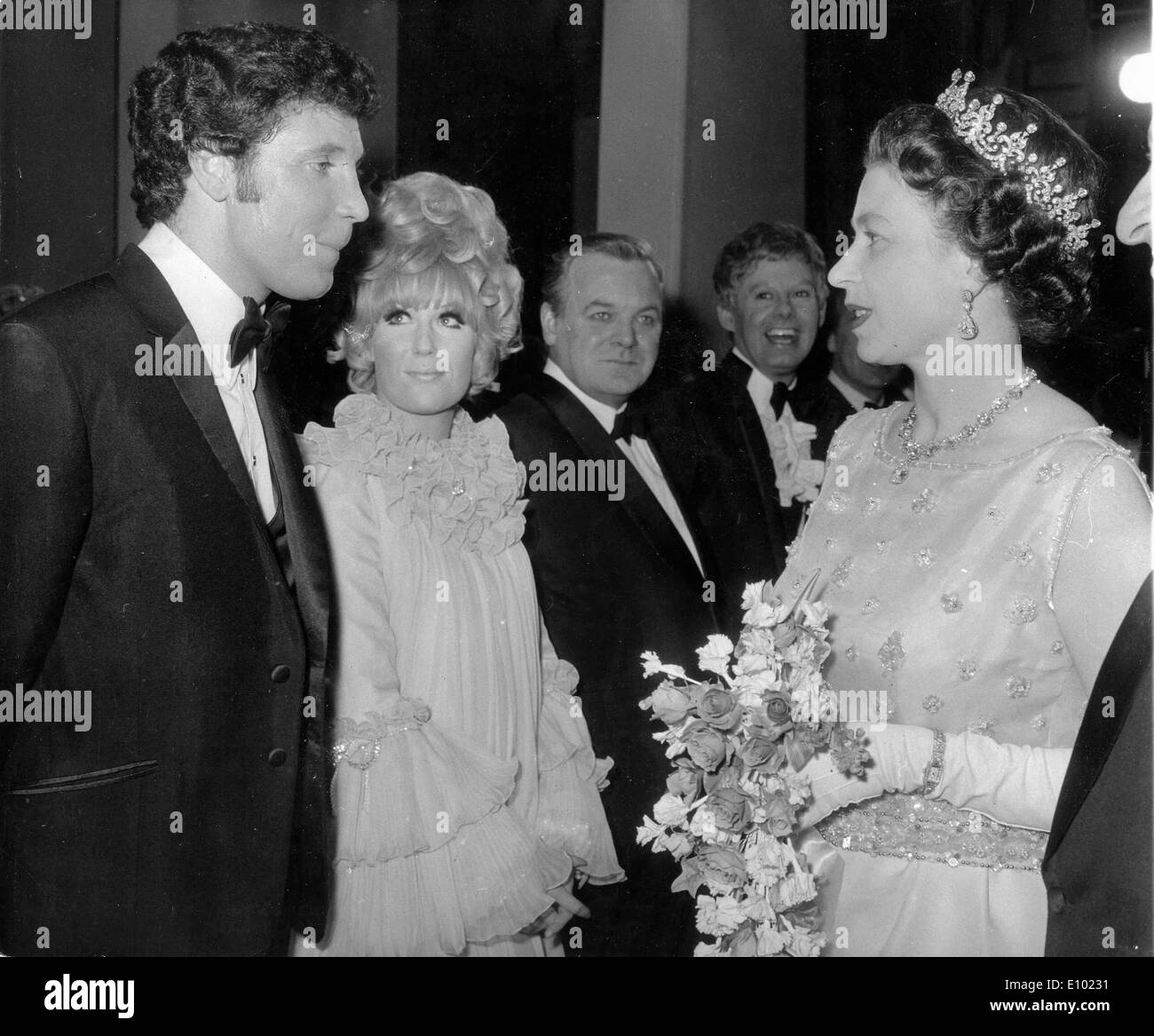 Queen Elizabeth II meets singer Tom Jones Stock Photo