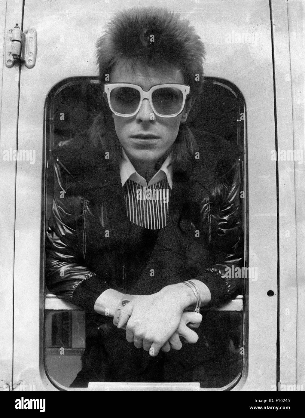 Portrait of pop singer David Bowie in train car Stock Photo