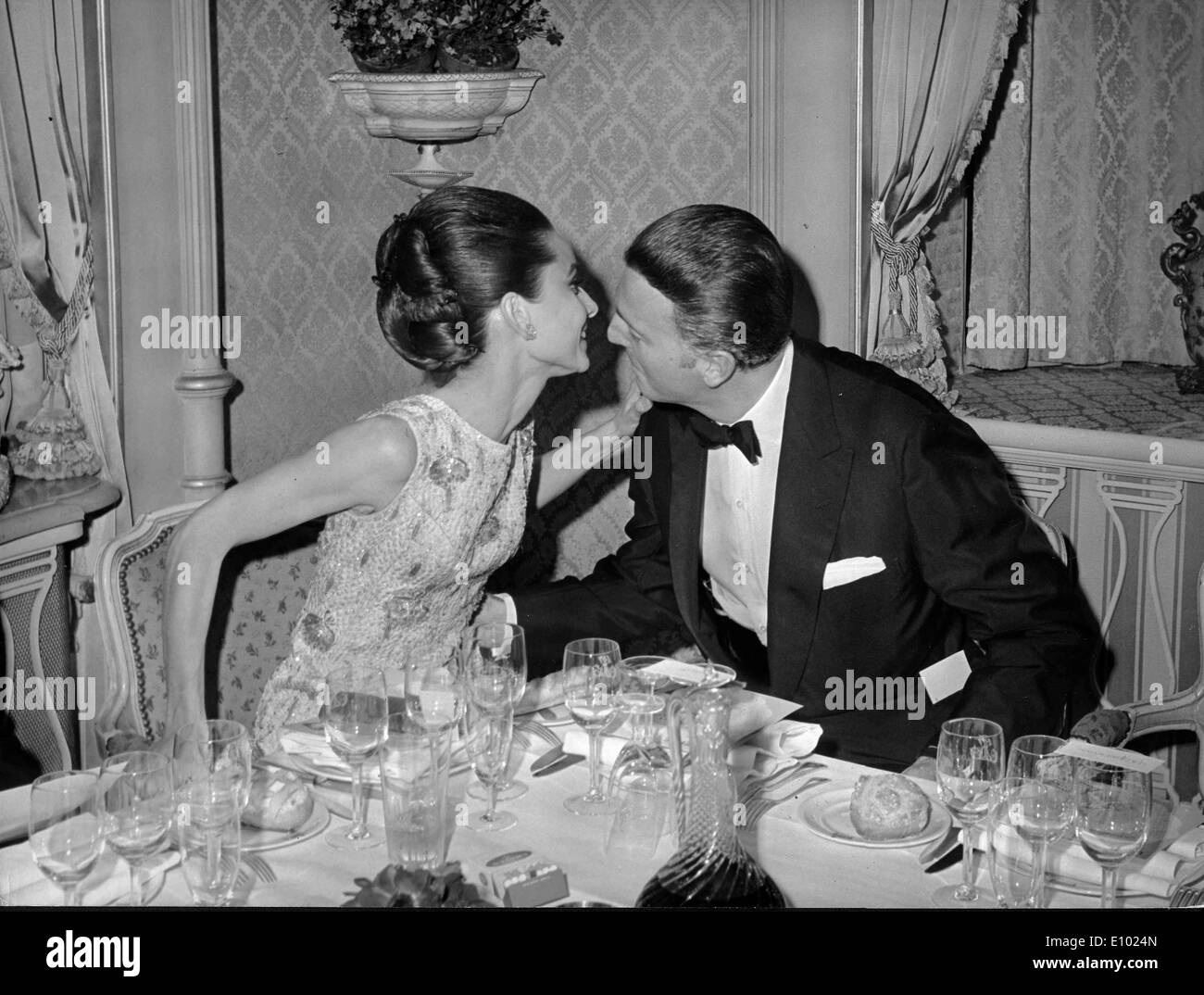 Actress Audrey Hepburn chats with Givenchy Stock Photo
