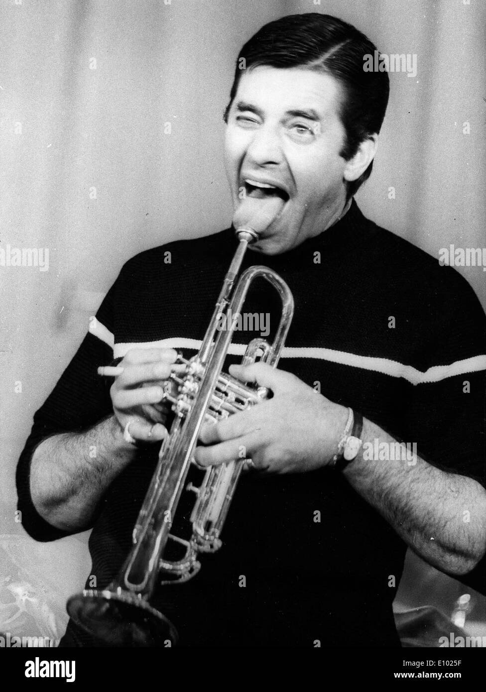 Comedian actor Jerry Lewis playing the trumpet Stock Photo
