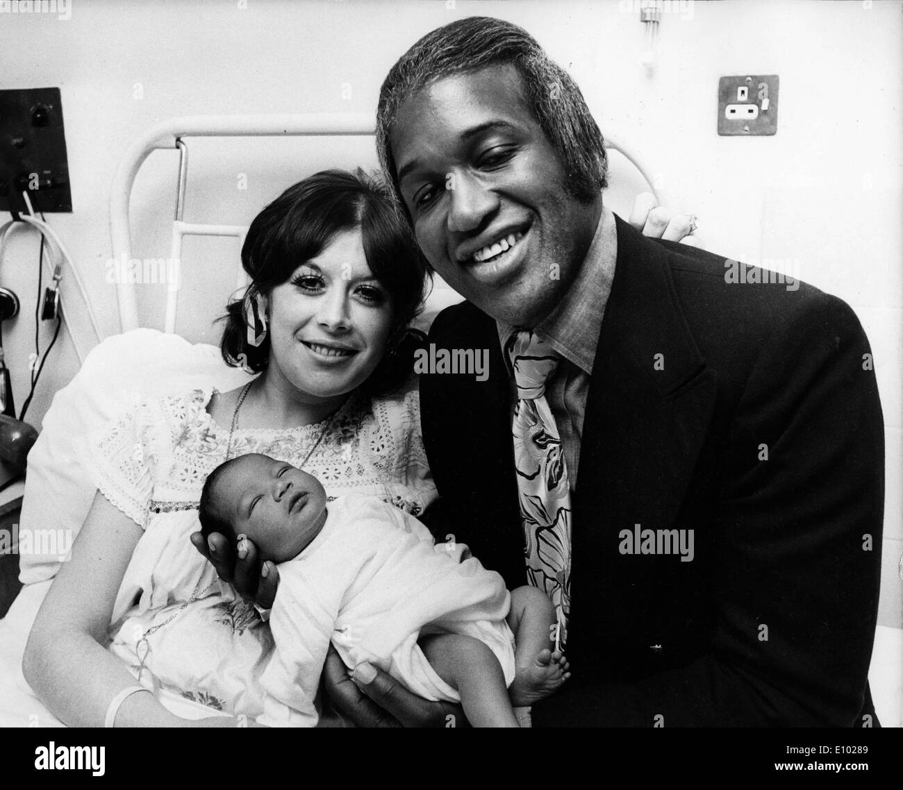 Singer Lovelace Watkins with girlfriend and baby Stock Photo