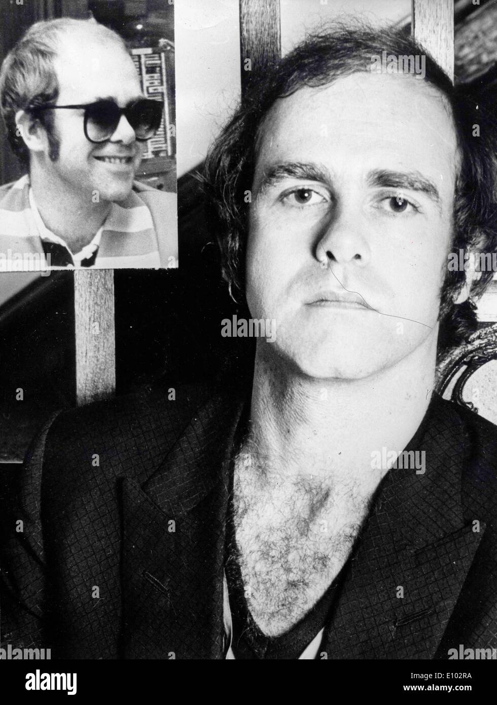 Singer Elton John gets hair back Stock Photo