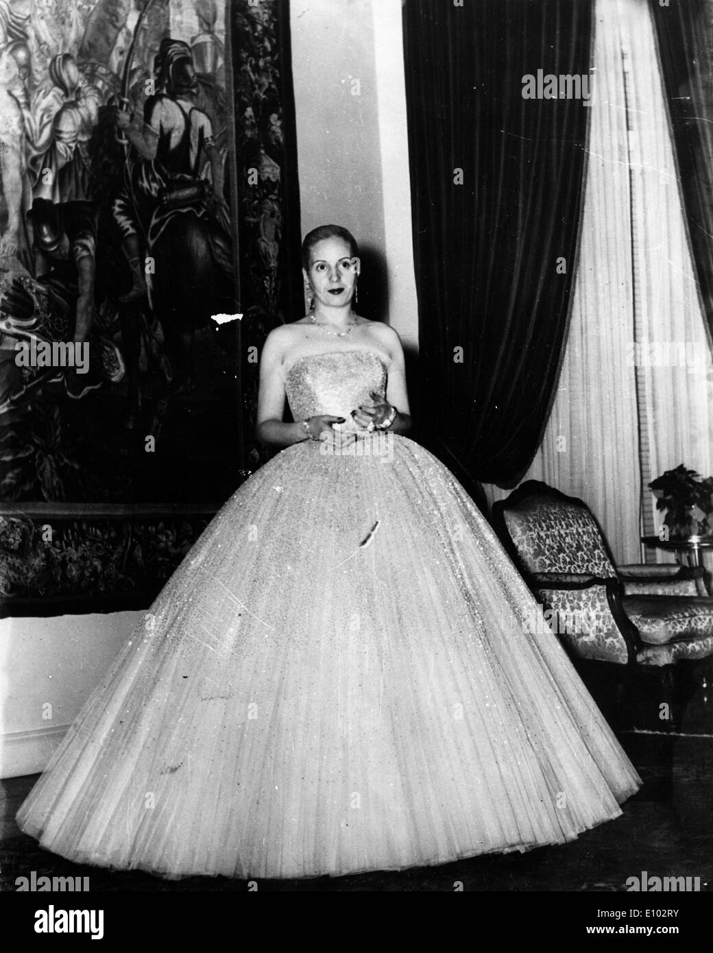 Eva Peron leaves for the theatre in a ball gown Stock Photo: 69458367 ...
