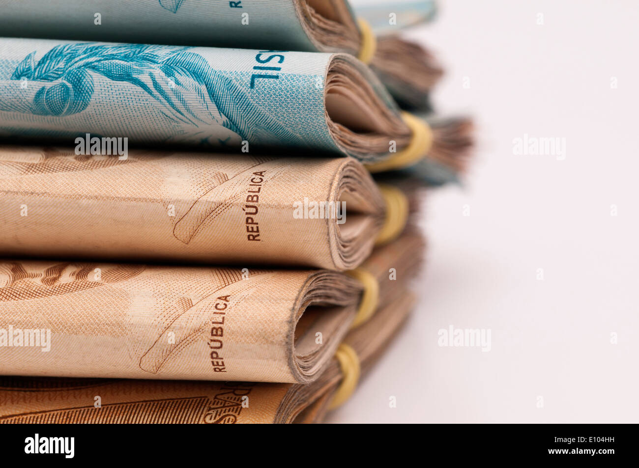 A few bills of brazilian currency (real) on white background Stock Photo