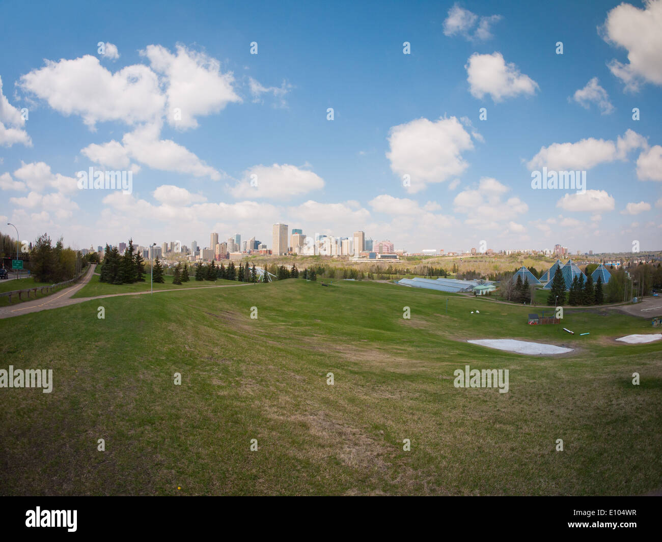 A wide angle view of Gallagher Park, the Edmonton skyline and the glass pyramids of the Muttart Conservatory. Edmonton, Canada. Stock Photo