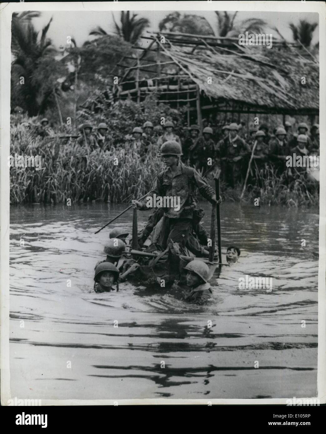 Jan. 1, 1970 - ''(Illegible)'' Troops In Anti-Guerilla Operations: ''(Illegible)'' Vietnamese troops are at work daily on ''(Illegible)'' ations aimed at crushing Viet Cong ''(Illegible)'' rillas in the Ba Xuyen Province. Using ''(Illegible)'' American-operated helicopters they are swoop- ''(Illegible)'' ing on villages which have been taken over by the Communist guerillas, who force the villagers to supply them with food. In one village people rushed from their huts to hide in a swamp while fighting raged. Photo shows Vietnamese soldiers ford a canal running through one village in Ba Xuyen. Stock Photo