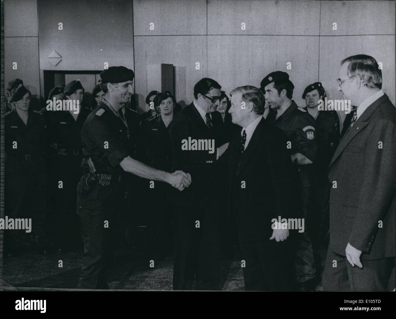 Jan. 1, 1970 - Federal Chancellor Helmut Schmidt (r) congratulates the commander of the GSG-9. Honored with the Federal Distinguished Service Cross in Bonn (FRG) had been 66 women and men. It were crew of the Lufthansa jet Boeing 737, which had been kidnapped by terrorists on October 13th, 1977, and the men of the GSG-9. They had assaulted the jet at the airport of Mogadischu/Somalia on October 18th and rescued the 86 hostages. Photo shows Federal Chancellor Helmut Schmidt (r.) congratulates the commander of the GSG-9 Ulrich Wegener (l.) Stock Photo
