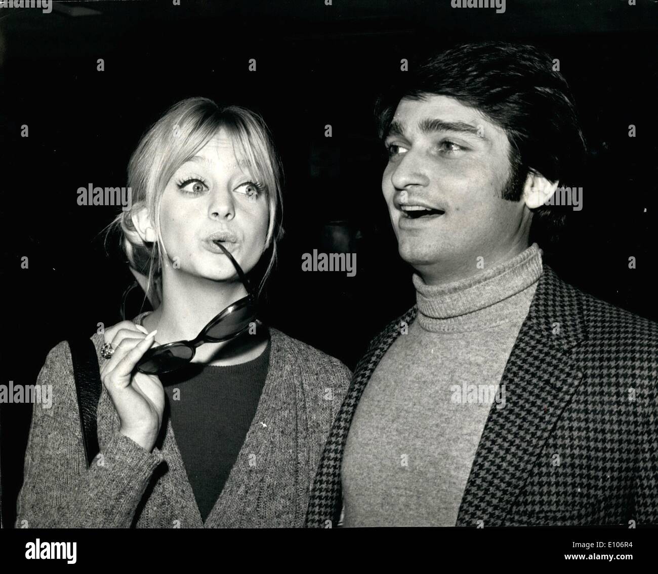 Jan. 29, 1970 - January 29th, 1970 Goldie Hawn arrives. Goldie Hawn, the kooky blonde of the American TV show, The Rowan and Martin Laugh-in seen on British TV, arrived at Heathrow Airport today. Tonight she will be one of the leading guests at the premiere in London's West End, of the film Marooned , which stars Gregory Peck. Goldie has made her first film Cactus Flower , and her second There's a Girl in My Soup will be made in Britain. Photo Shows: Goldie Hawn pictured on her arrival at Heathrow Airport, with her husband, Gus Trekonis. Stock Photo