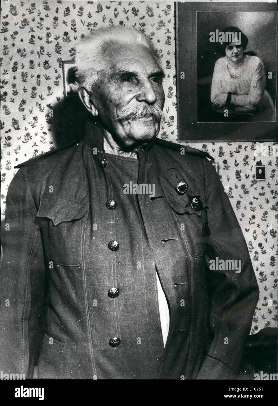 Feb. 02, 1970 - Czarist Refugees ' Community, Luserna [Near Turin], Italy Photo shows Colonel Vassilj Skrotsky wearing the old uniform of the colonel of the Ussarc and posing in front of the pictures of his wife Alexandra, died some years ago. On the uniform he has the badge that he received when he attended at the Olimpic Games in Sweden in 1912. he is 83 and during the World War I fighteed against the German and the Austrian taking command of the regiment'' The shooters of the Siberia. Stock Photo