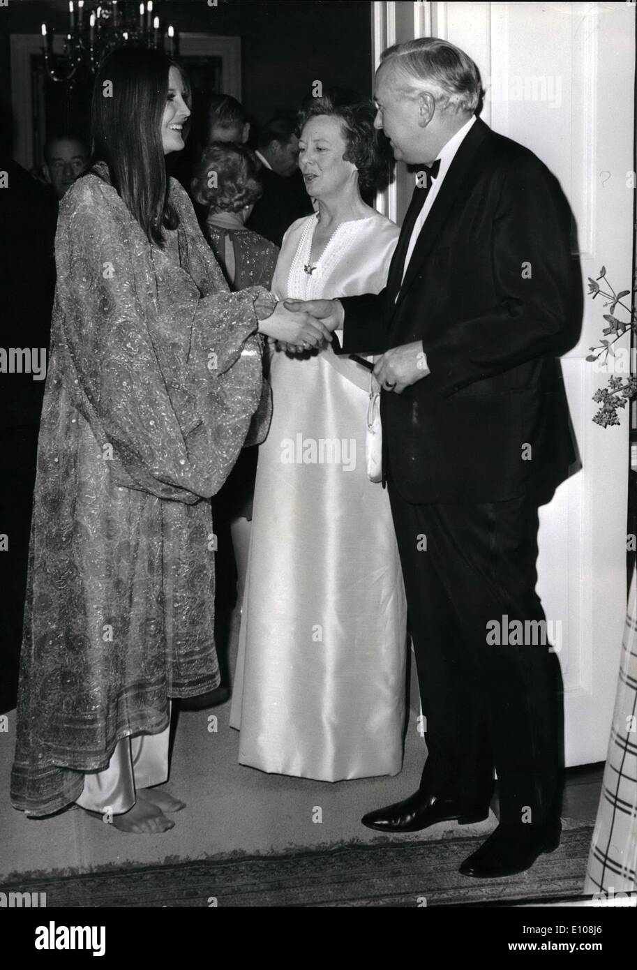 Mar. 03, 1970 - Sandie Shaw meets the Premiere: Pop singer Sandie Shaw, barefooted despite the suspicious occasion, is greeted by Prime Minister Mr. Harold Wilson and his wife, Mary, at a reception at No. 10, Downing Street last night, given in honour of Herr Willy Brandt, the West German Chancellor. Stock Photo