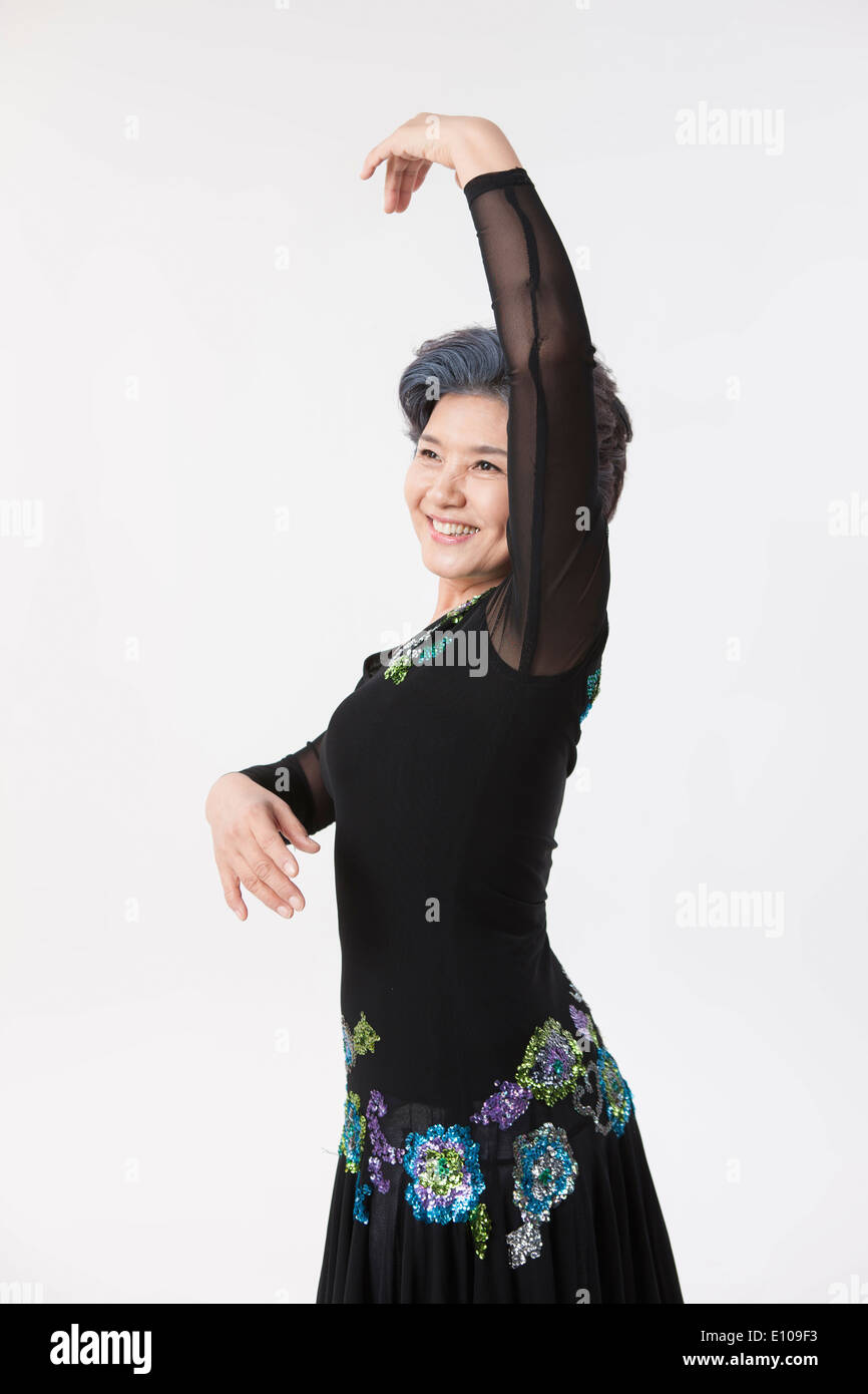 Woman in black dress dancing hi-res stock photography and images - Alamy