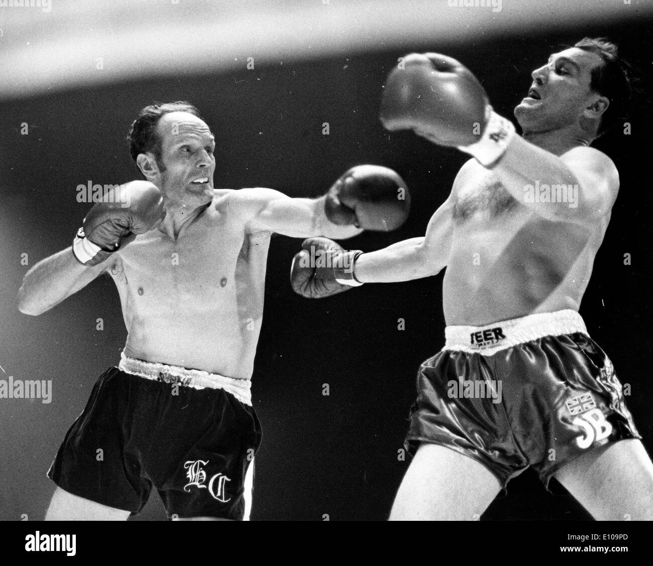 Mar 25, 1970; London, UK; HENRY COOPER throws a left at JACK BODELL at Wembley and recaptures the Title. Stock Photo