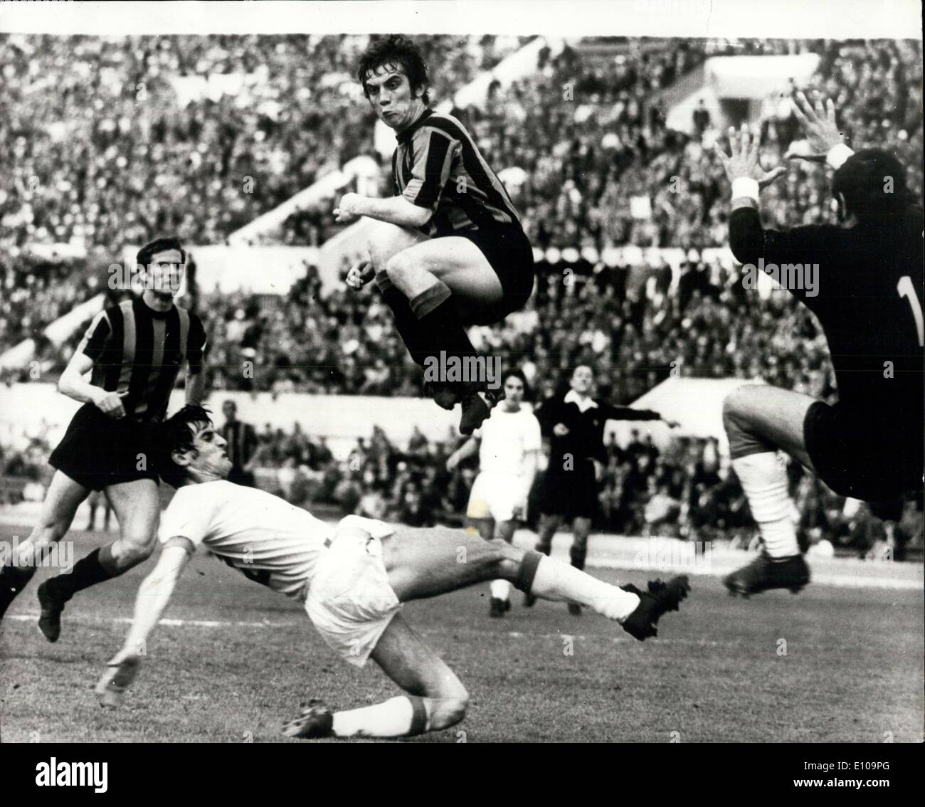 Mar. 26, 1970 - Up in the Air: An all-action picture taken during the soccer match at the Olympic Stadium in Rome, between Lazio of Rome and Internationals of Milan - showing an expressive study of the Inter center-forward Pino Boninsegan leaps high over Giorgio Papadopulo, the Laio right-back. On left is Giacinto Facchetti of Inter and on right is Lazio's goalkeeper Rosario Di Vencenzo, Lazio won 3-1. Stock Photo