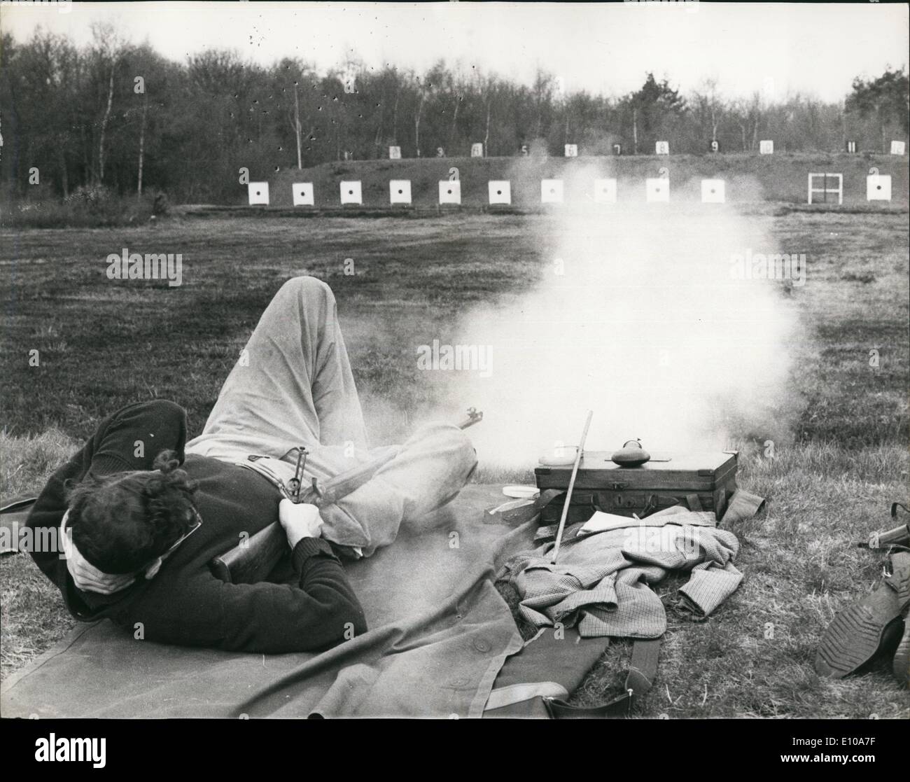 Apr. 04, 1970 - Muzzieloaders Recall Sounds of Past Battles.: ''Veterans'' of the Crimean War and the Indian Mutiny were is action again yesterday - on the bleak Siberia Range at Bisley, Surrey. The occasion was the Crimen Medal Shoot of the Muzzleoaders Association of Great Britain. Photo shows Among the 60 members taking part was Mr. Tan Dividson, of Croydon, with his 1870 John Rigby match 0.451 calibre rifle. He used the favoured  position to fire the &pound;300 gun with original eight box. to obtain 1,000 yd accuracy. Stock Photo