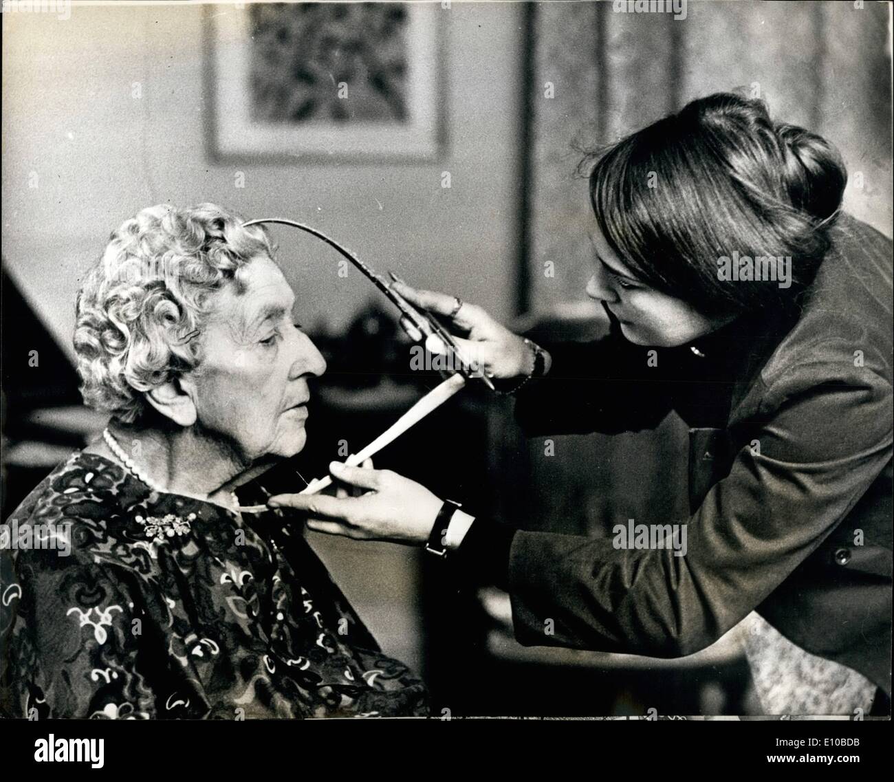Mar. 03, 1972 - Agatha Christie for madame Tussaud's: photo shows Madame Tussaud's sculptor Lyn Kramer takes caliper measurements at a recent interview with Agatha Christine at her home in Berkshire. Her wax portrait will take its place in the new Grand Hall at Madama Tussaud's later this year. Stock Photo