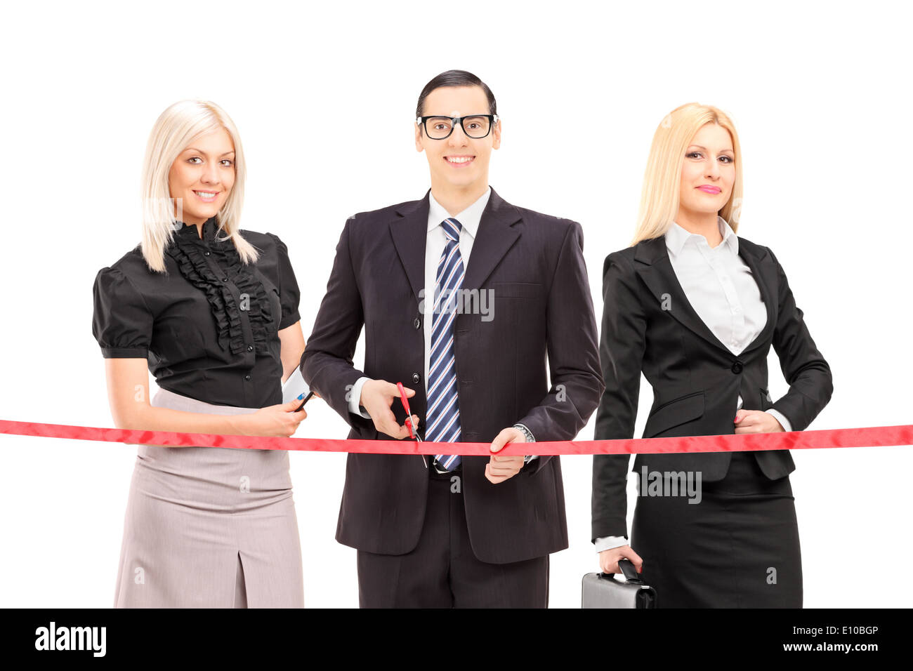 Business people cutting a red tape Stock Photo Alamy