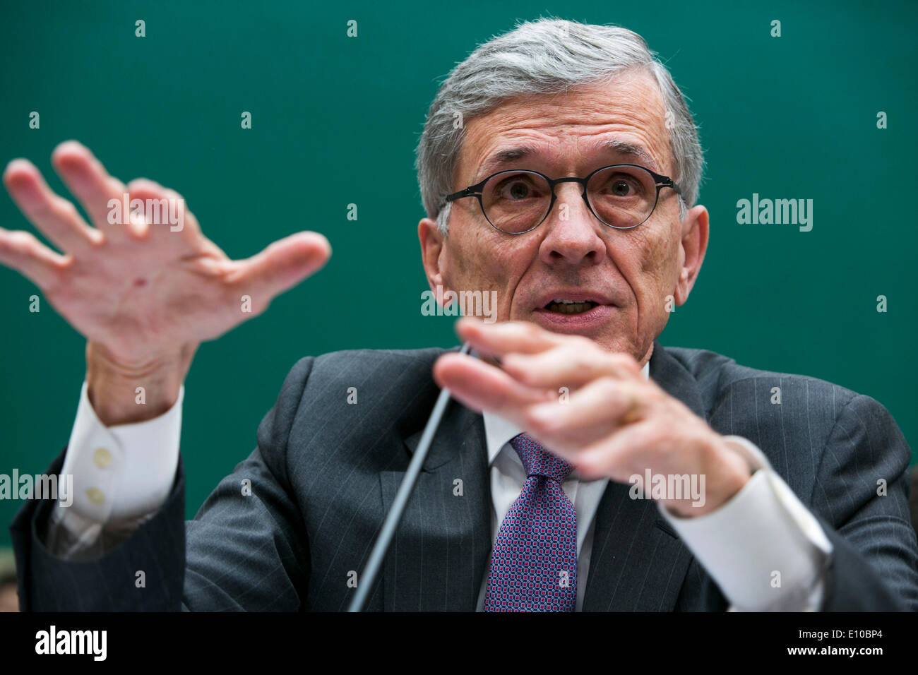 Washington DC, USA. 20th May 2014. Federal Communications Commission Chairman Tom Wheeler testifies before the House Energy and Commerce Committee Communications and Technology Subcommittee during a hearing on oversight of the Federal Communications Commission in Washington, D.C. on May 20, 2014. Credit:  Kristoffer Tripplaar/Alamy Live News Stock Photo