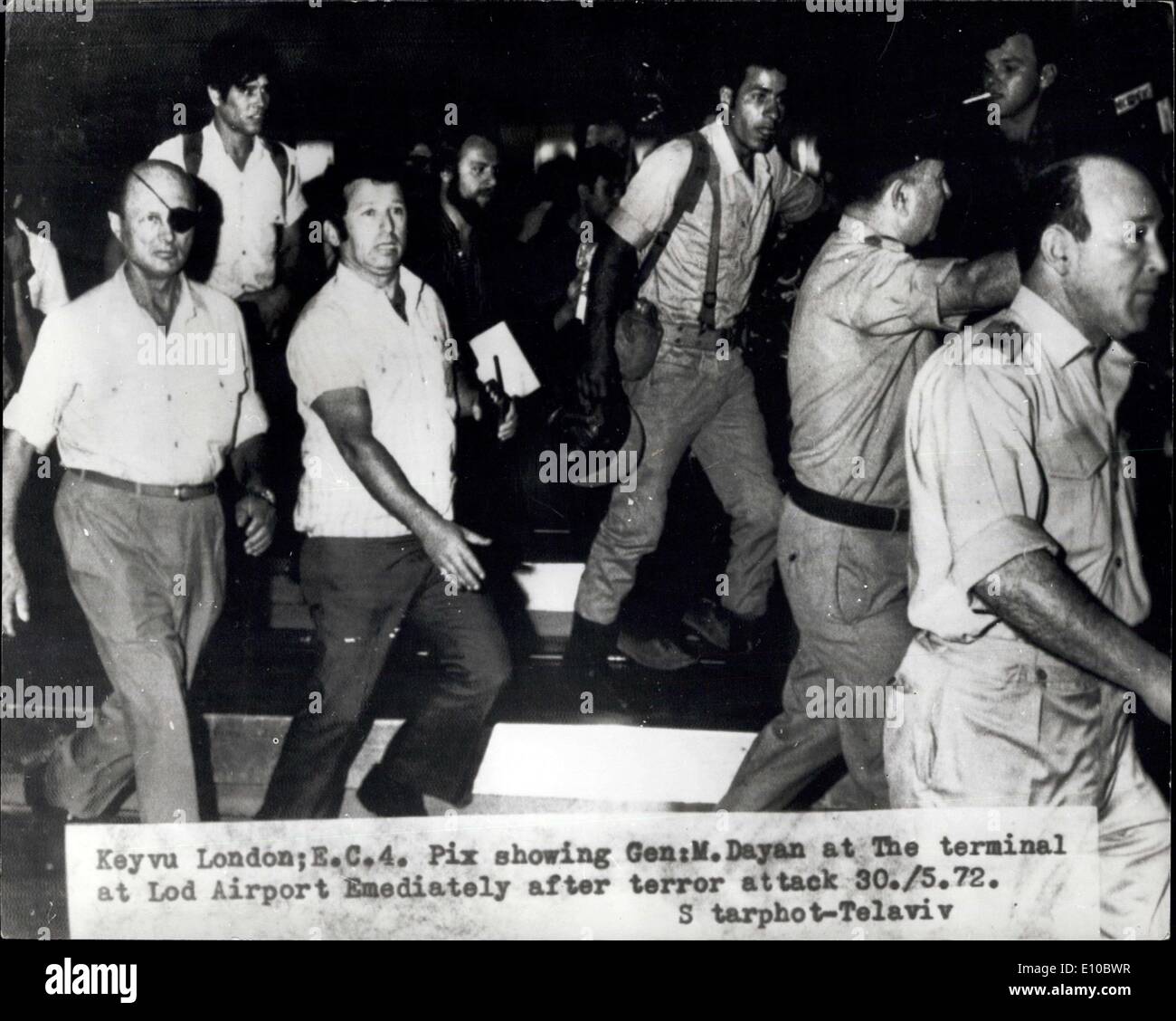 May 31, 1972 - 26 killed in Terrorist attack at Tel Aviv airport.: 26 people were killed and many injured when three Japanese terrorists fired automatic rifles and threw hand grenades into the terminal at Lod Airport. Tel Aviv last night. Photo shows the Israel Defense Minister, Moshe Dayan (left), at the terminal at Lod Airport immediately after the terrorist attack. Stock Photo