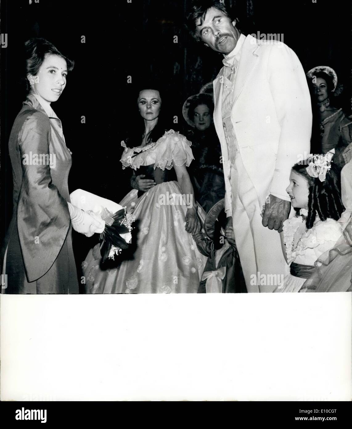 Apr. 04, 1972 - Princess Anne meets the stars of the stage Musical ''Gone with the wind'': Photo shows Princess Anne wearing a slash pleated raw silk gown, meets June Ritchie (Scarlet O'Hare) and Harve Presnell (Rhett Butler), the stars of the stage musical ''Gone with the wind''. The performance was held in aid of the World Wildlife fund at the Drury Lane Theater London, last night. The child on the right is Bonnie Langford, who shares the child role of Bonnie. Stock Photo