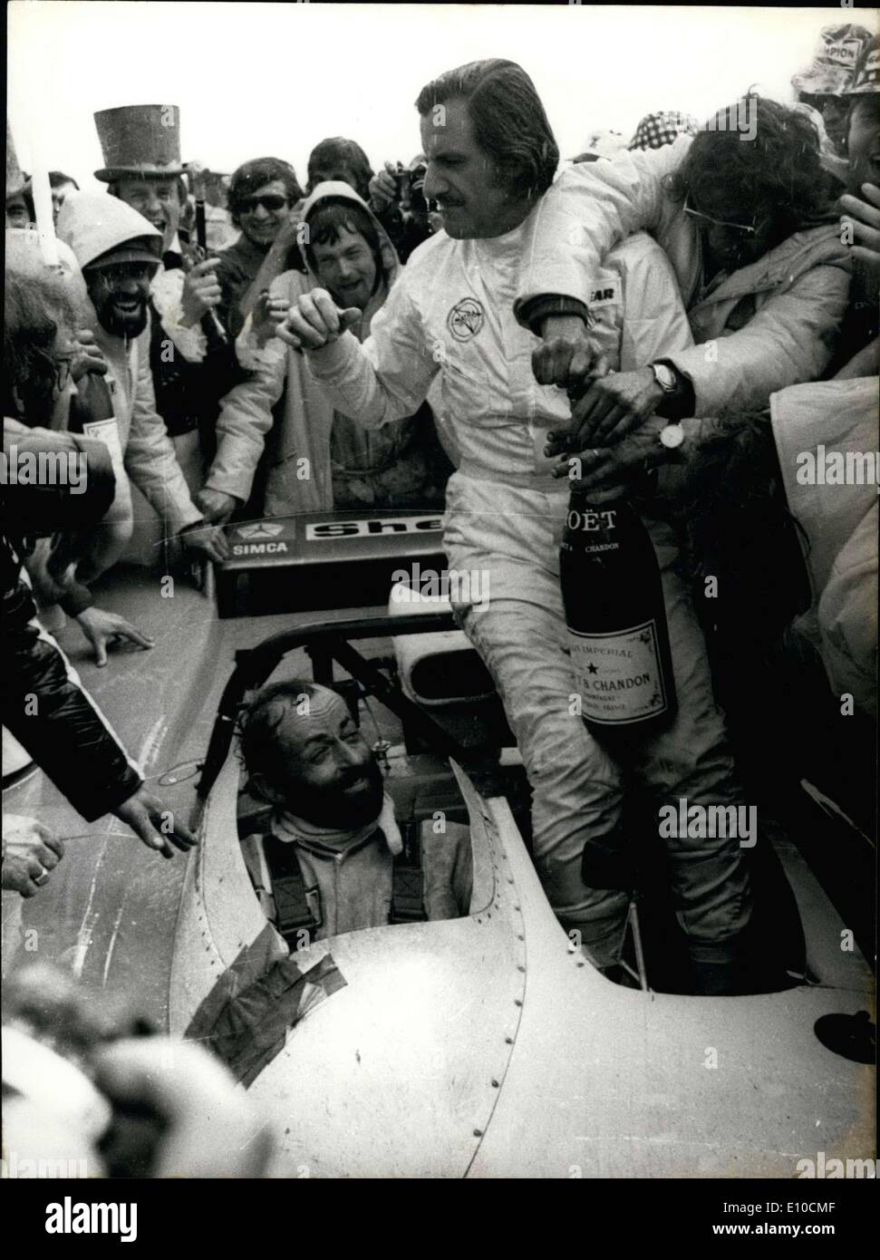 Jun. 11, 1972 - The famous car race, ''24 Heures du Mans,'' which was held at the La Sarthe track was won by Henri Pescarolo's and Graham Hill's team. Fans are pictured surrounding the winners' car. Stock Photo