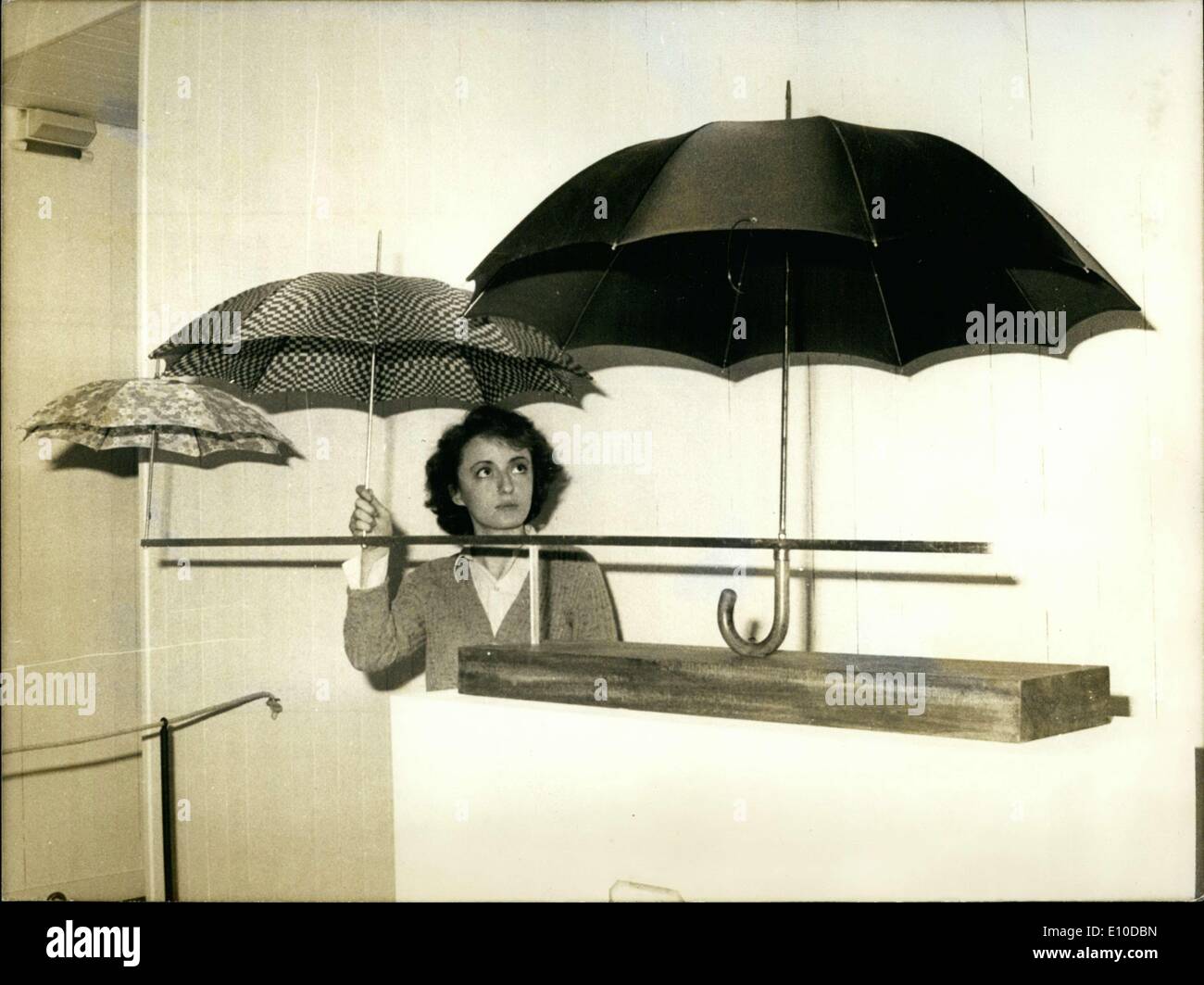 Apr. 28, 1972 - Need a Humorous Family Umbrella Solution? Stock Photo