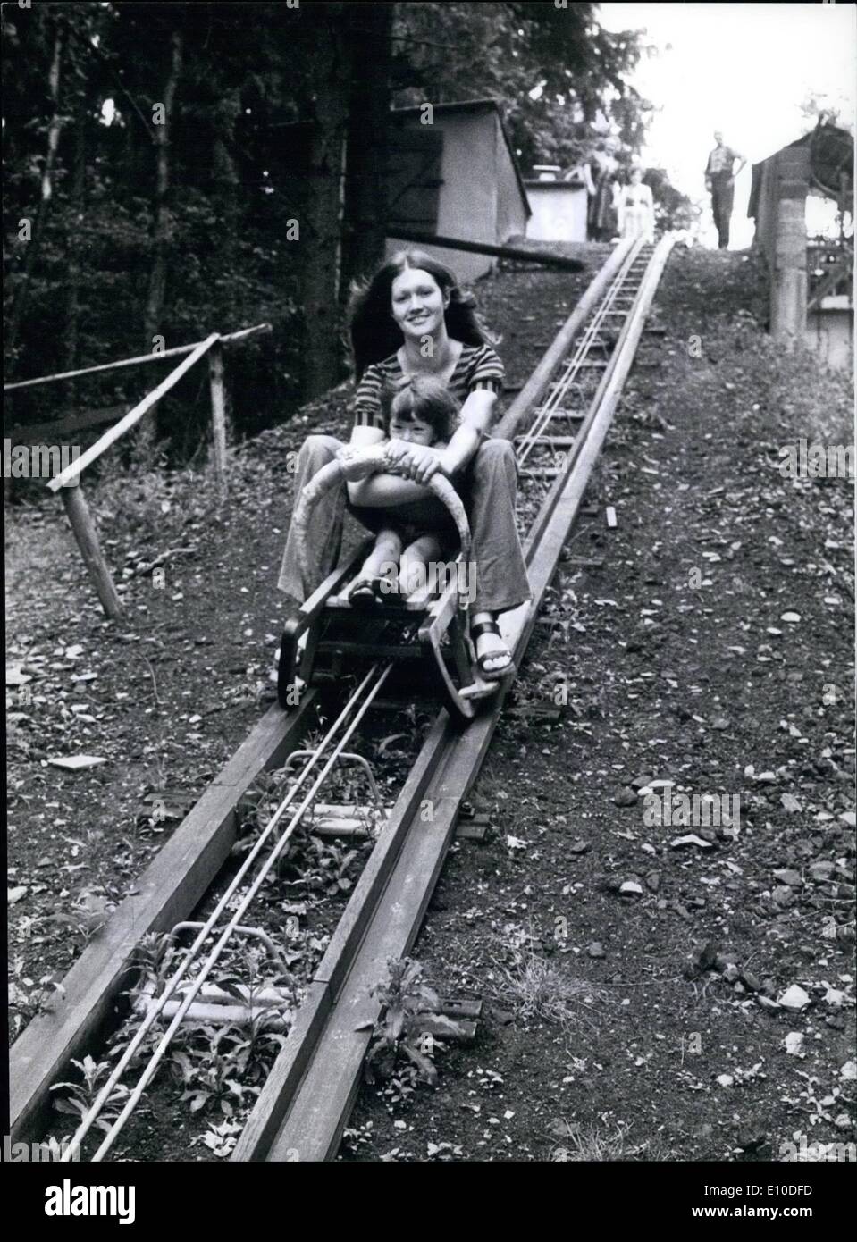 Tobogganing now in summer as well hires stock photography and images