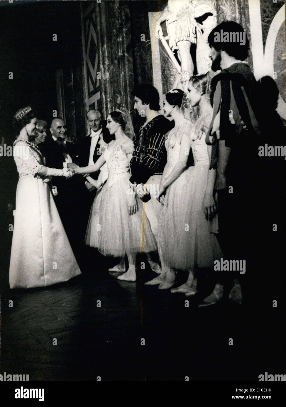 May 16, 1972 - The British royalty were invited to Versailles last night by President Pompidou and his wife, where, they attended the ballet ''Gisele'' after dinner at the Louis XV Theater. Here, Queen Elizabeth shakes the hand of one of the ballerinas. Stock Photo