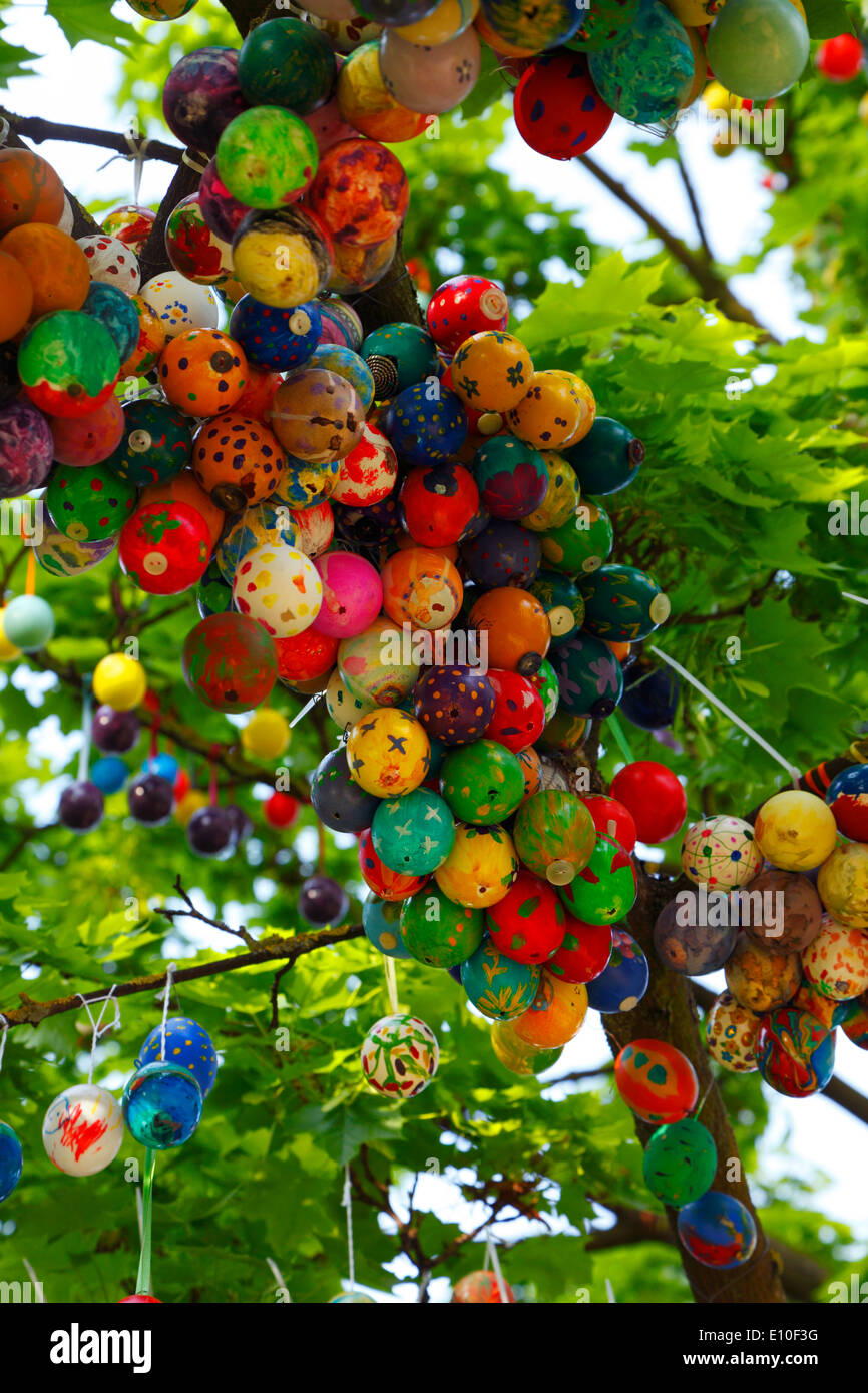 festive season, annual festivals, Easter, Easter customs, painted eggs at a tree in the castle gardens of the residence castle of Ludwigsburg in Baden-Wuerttemberg Stock Photo