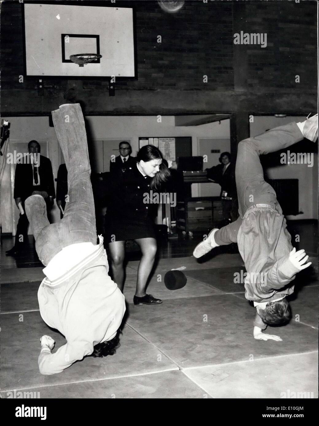 Jan. 08, 1973 - Metropolitan Police Women's Self-Defence Team Display: The Metropolitan Police Women's Self-Defence team display, was held today at Norwood Cadet Training Centre, Upper Norwood. Photo Shows: W.P.C. Theresa Goodhall, 25, of Bellshill, Lanarkshire, shows her skill in self-defense as she throws two men who attacked her, during the display today. Stock Photo
