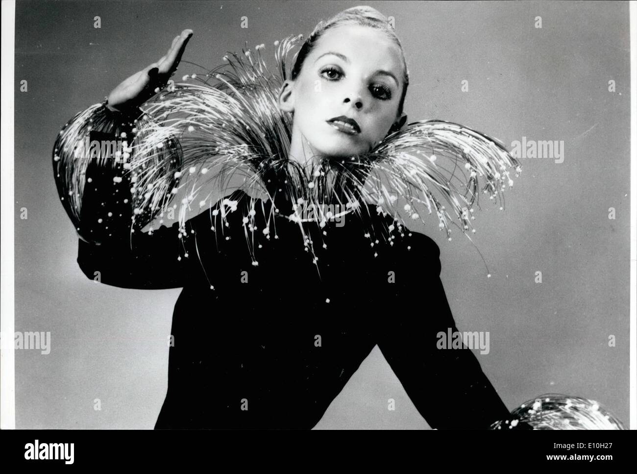 Nov. 11, 1972 - A real neck tickler: One of the unusual accessories seen at the Tokyo Jewellery display is named ''Marie Antoinette'', and is comprised of strands of thin gold wire each carrying a pearl at the tip. The sleeves of the dress worn by the model are encased in a gold wire cage studded with pearls. The accessories were designed by Mme Michi Takehisa of Japan. Stock Photo