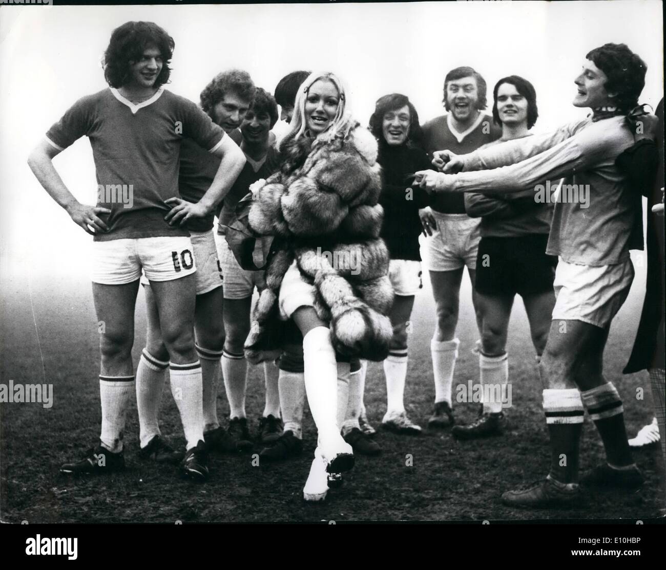 Feb. 02, 1973 - Adrienne Posta kicks off BBC Panto Soccer game: Adrienne Posta, lovely blonde star of Babas in the wood' the Palladium Pantomime, yesterday exchanged her role of Maid Marion to become footballer when she kicked off the match between the Pantomime staff and BBC tv' s General Features team. Photo shows Adrienne Posta, well wrapped up in fur coat, kiks off for the start of the match. Stock Photo
