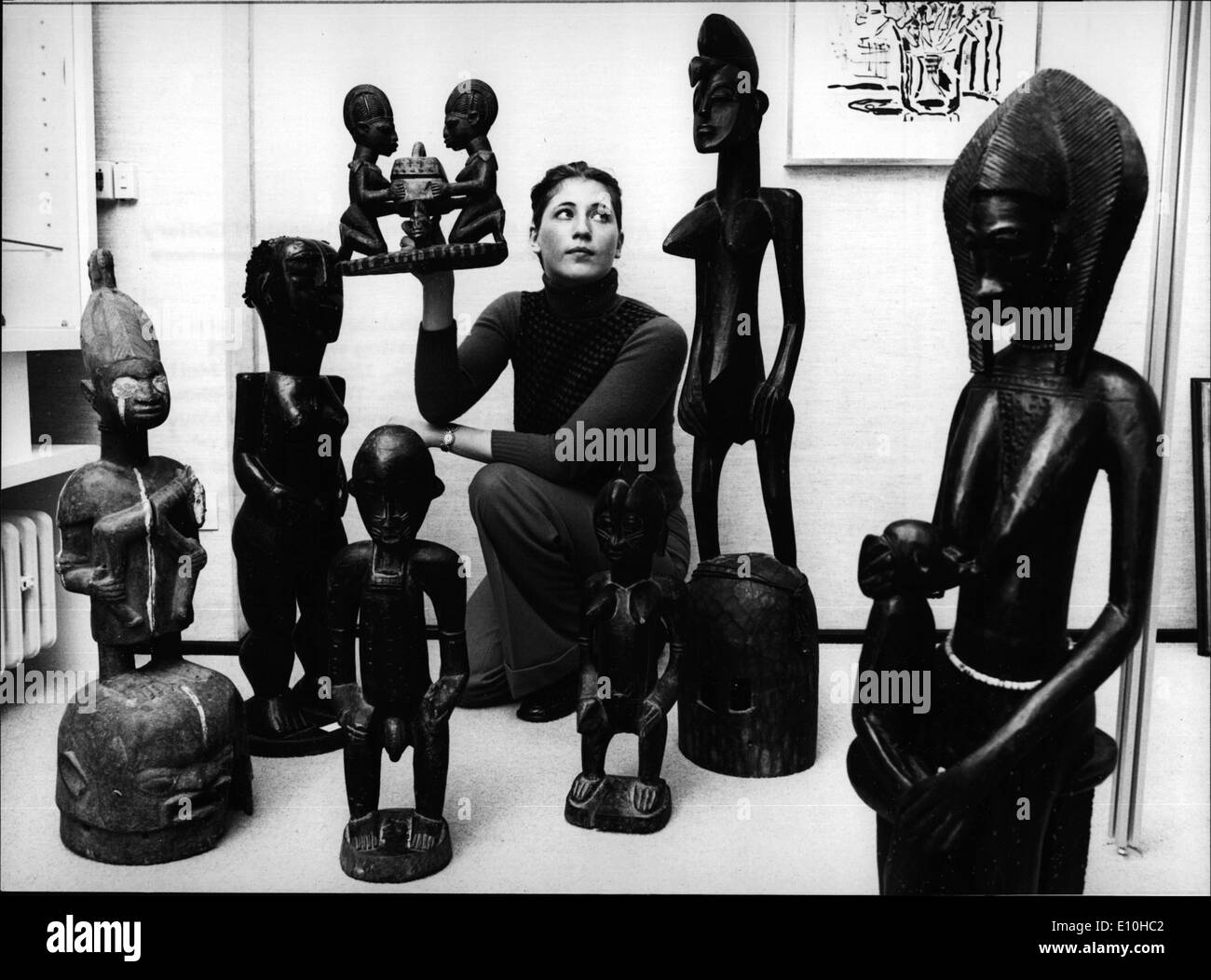 Feb. 02, 1973 - Traditional African Art Exhibited In A D&uuml;sseldorf Gallery Cornella sits among some of the sculptures which Stock Photo