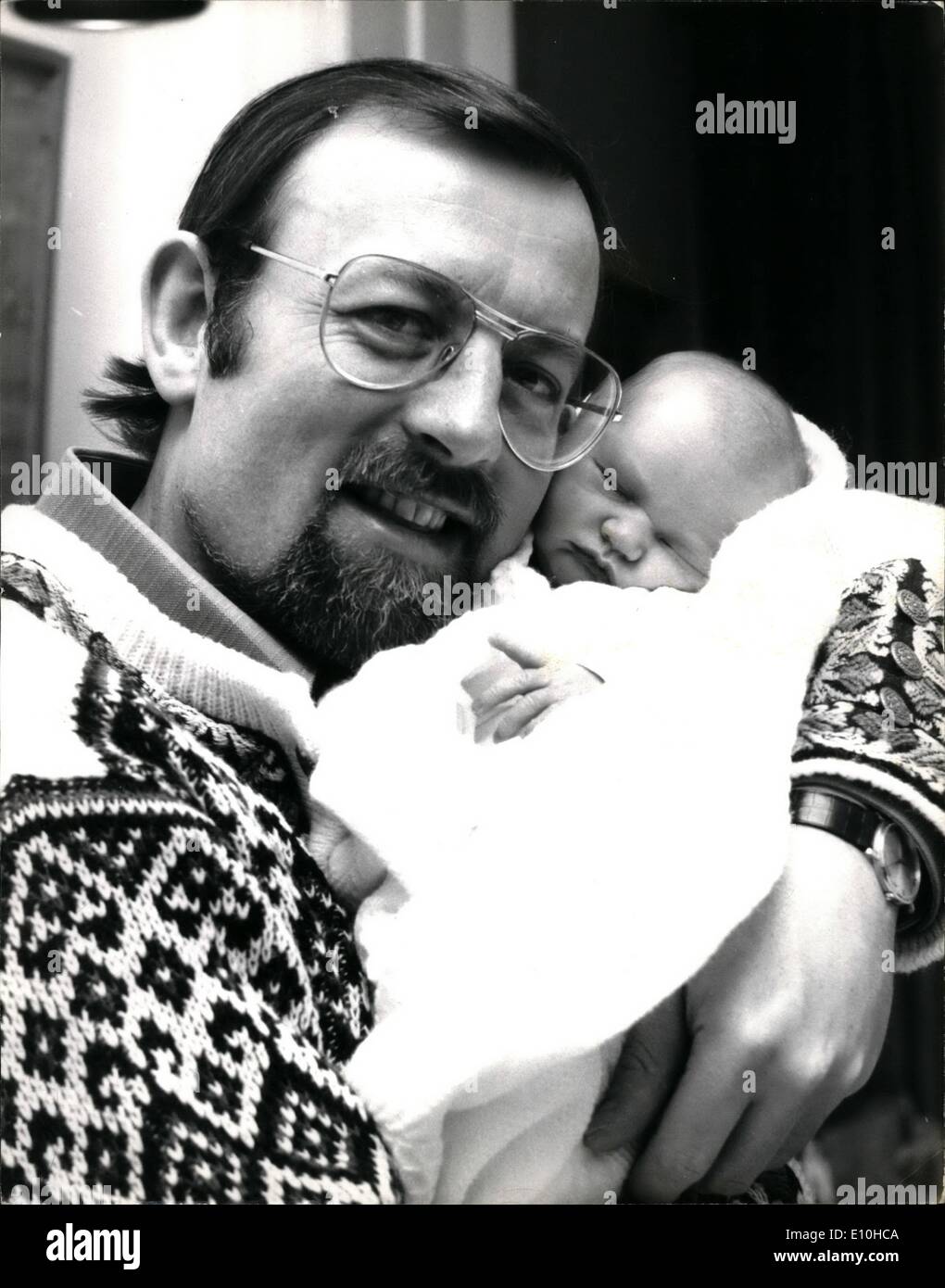 Feb. 02, 1973 - Roger Whittaker Introduces his new daughter, Jessica: Singing star Roger Whittaker, pictured today at the Avenue Clinic, St. John's Wood, with his baby daughter, Jessica, to whom his wife Natalie gave birth on St. Valentine's Day. Stock Photo