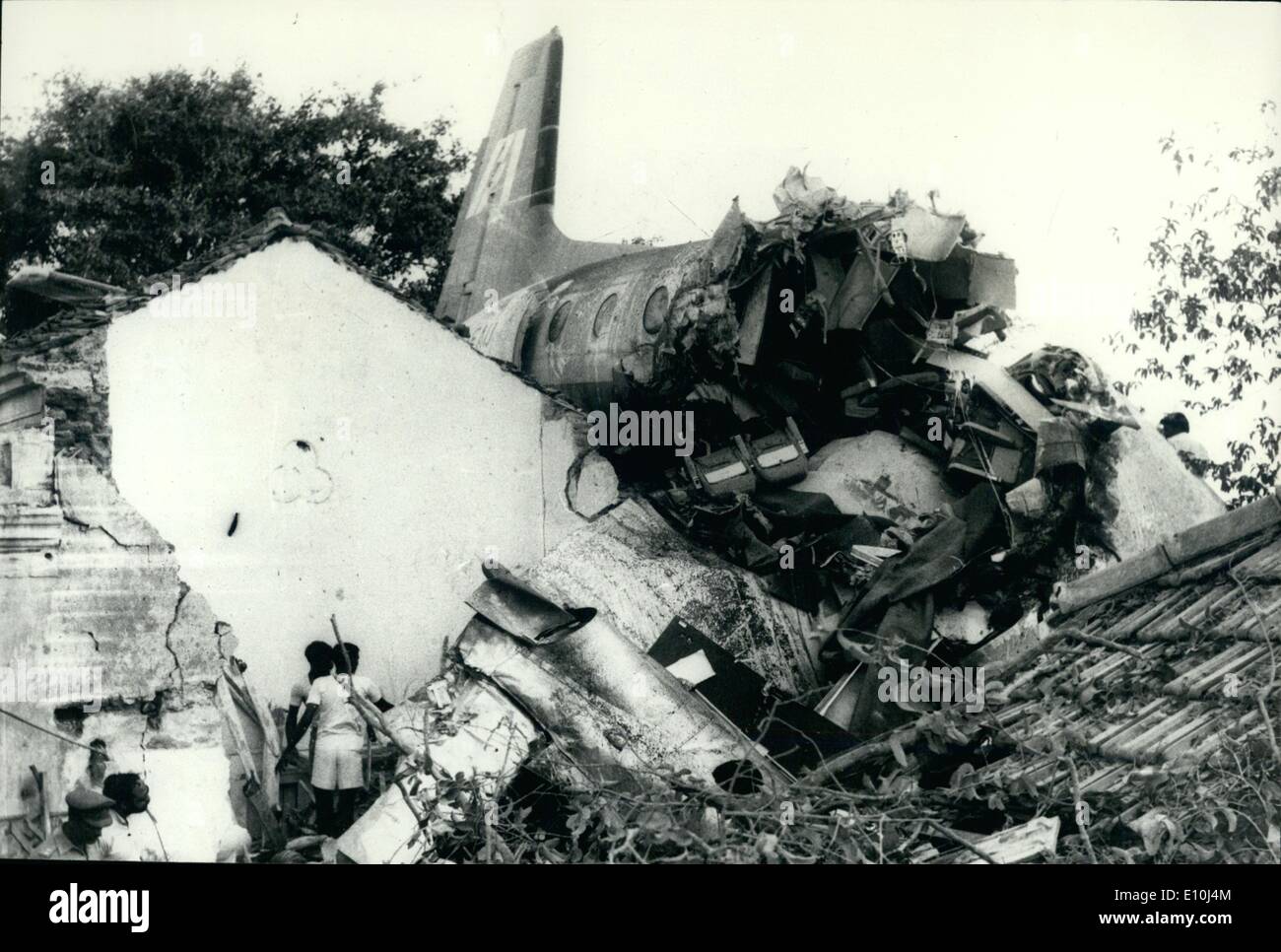 Mar. 03, 1973 - Indian Airlines Avro trainer-plane which crashed into a house in Secundrabad (Andhra Pradesh) on March 15, 1973, killing all the three occupants. It also led to the resignation of the Union Minister for Civil Aviation and Tourism Dr. Karan Singh which has since been rejected by Prime Minister Mrs. Indira Gandhi. Our photo shows the engine and cockpit buried in the house while the body lands on top of a building. Stock Photo
