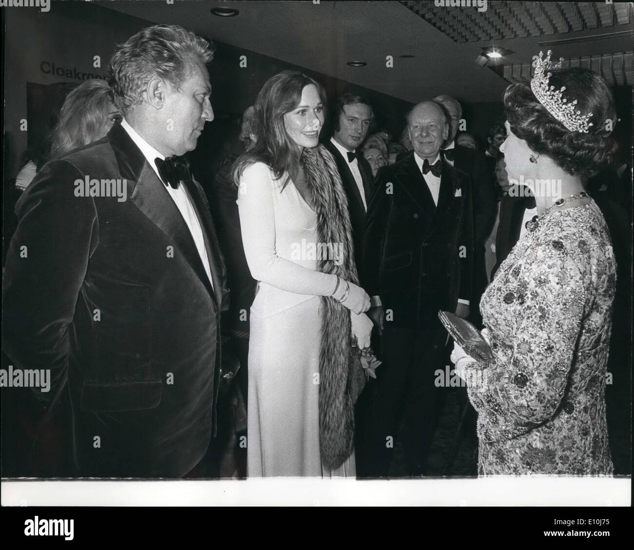 Mar. 03, 1973 - Royal Film Performance: H.M. The Queen seen talking with American actress Sally Kellerman, at the Odeon Theatre, Leicester Square. London, last night, before the Royal Film Performance of ''The Lost Horizon'', which Miss Kellerman stars. Looking on are two other stars of the film, Peter Finch (left), and Sir John Gielgud. Stock Photo