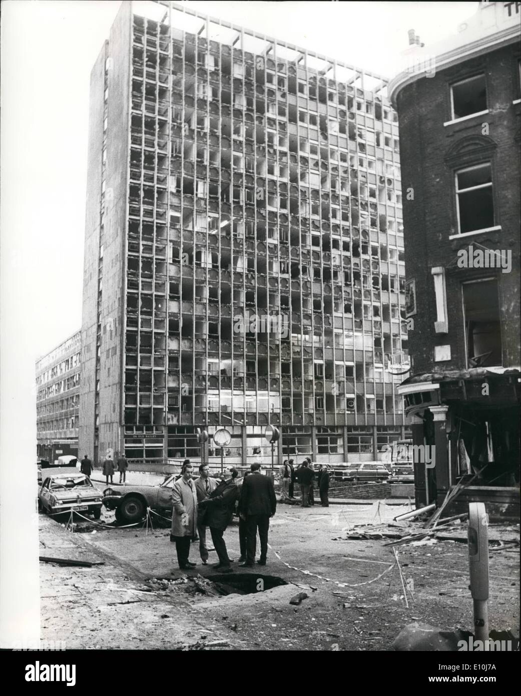 Mar. 03, 1973 - Bomb Blasts in London. : One man was killed and 212 people injured in the two car bomb explosions that shook London yesterday. One was outside the Old Bailey and the other went off in Great Scotland Yard off Whitehall. Photo Shows This was the scene showing the crater left by the car bomb explosion at the Old Bailey, showing in background, the shattered windows of a tall office block. Stock Photo