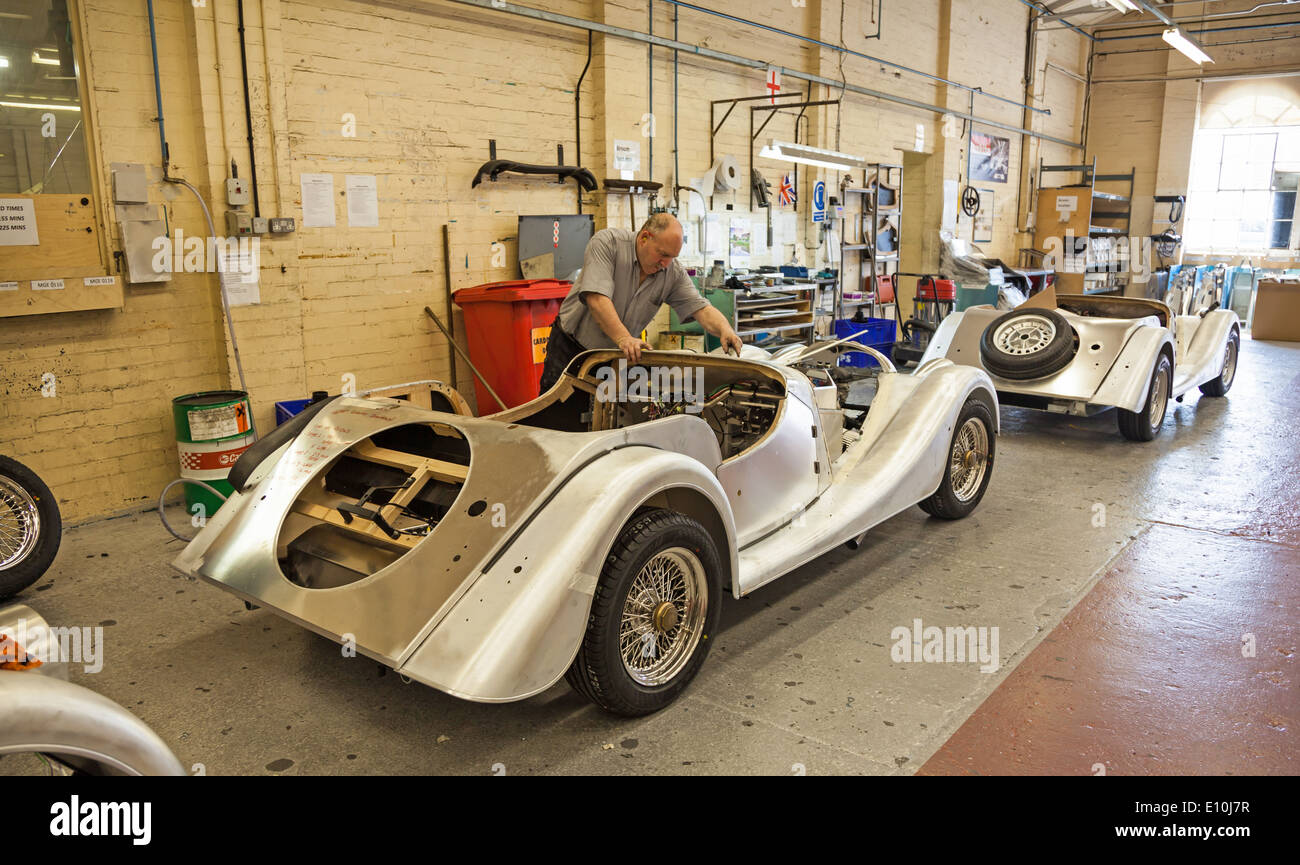 Cars being assembled by hand using Ash wood and Aluminium on the