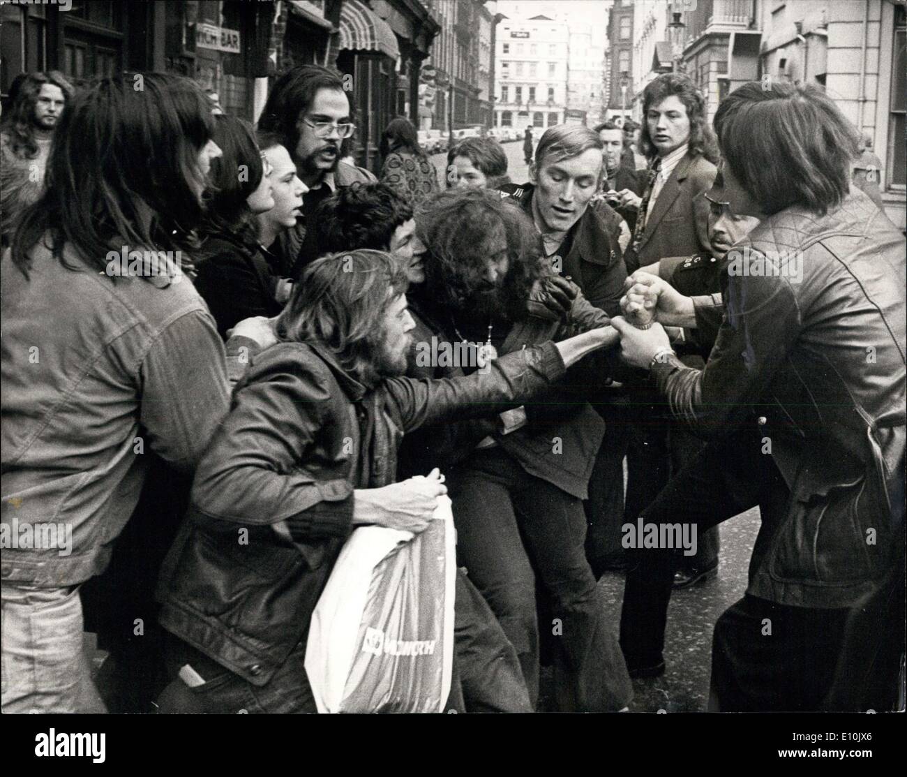 Mar. 10, 1973 - March 10th 1973 Women's Lib and supporters stage sit-down in Trafalgar Square Post Office after rally. Women's Lib marchers who marched through London this afternoon to a rally in Trafalgar Square during which a break away group marched to the Trafalgar Square Post Office and stage a sit-in, in protest against Family allowance pay-outs. Police were called and they cleared from the post office making some arrests. Photo Shows: Women's Lib and supporters seen struggling with police outside the post office today. Stock Photo