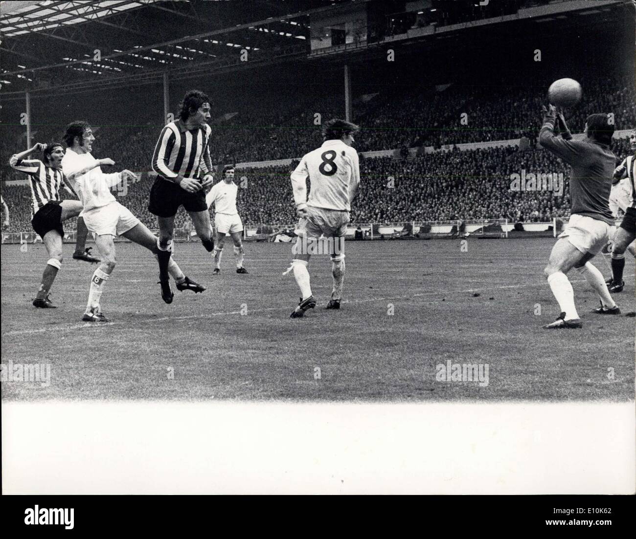 May 05, 1973 - Sunderland Beat Leeds 1-8 Ina the FA Cup Final at Wembley - Sunderland Became the first Second Division Team to Win the FA Cup Since 1931 When they Beat First Division Leeds United By 1-0 at Wmbley this Afternoon. Photo Shows - Tjird from Left Porterfield the Suinderland inside forward beats the Leeds Goalie D. Harvey to Score the Winninn Goal Flanked by Hunter the Leeds WIng-Half and Clarke the Leeds at Wembley Today. Stock Photo