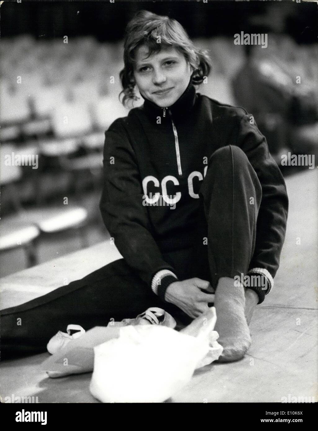 May 05, 1973 - Soviet Gymnasts prepare for their appearance at Earls Court this evening: The Soviet gymnastic team who are in London to give five shows organised by the British Amateur Gymnastics Association, and sponsored by the London Daily Mirror, at Earls Court, were today limbering up for their first performance there this evening. Photo shows Little Olga Korbut, a member of the Russian team, and the Golden girl of gymnastics, adjusting her shoes before a practice session at Earls Court today. Stock Photo